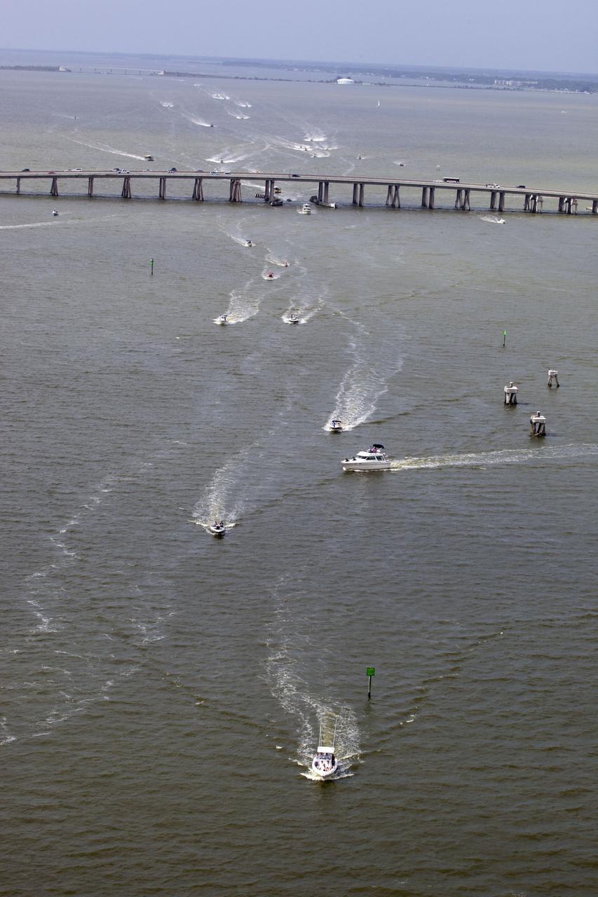 CAPE CANAVERAL, Fla. -- After 30 years and 135 missions, residents and visitors to Florida's Space Coast traverse the waters near Port Canaveral to see the rocket's red glare of NASA's Space Shuttle Program soar for the last time. Space shuttle Atlantis is scheduled to liftoff at 11:26 a.m. EDT from Launch Pad 39A at NASA's Kennedy Space Center in Florida. On board will be four experienced astronauts -- STS-135 Commander Chris Ferguson, Pilot Doug Hurley, and Mission Specialists Sandy Magnus and Rex Walheim.          STS-135 will deliver the Raffaello multi-purpose logistics module packed with supplies and spare parts for the International Space Station. Atlantis also will fly the Robotic Refueling Mission experiment that will investigate the potential for robotically refueling existing satellites in orbit. In addition, Atlantis will return with a failed ammonia pump module to help NASA better understand the failure mechanism and improve pump designs for future systems. STS-135 will be the 33rd flight of Atlantis, the 37th shuttle mission to the space station, and the 135th and final mission of NASA's Space Shuttle Program. For more information visit, www.nasa.gov/mission_pages/shuttle/shuttlemissions/sts135/index.html. Photo credit: NASA/Frank Michaux