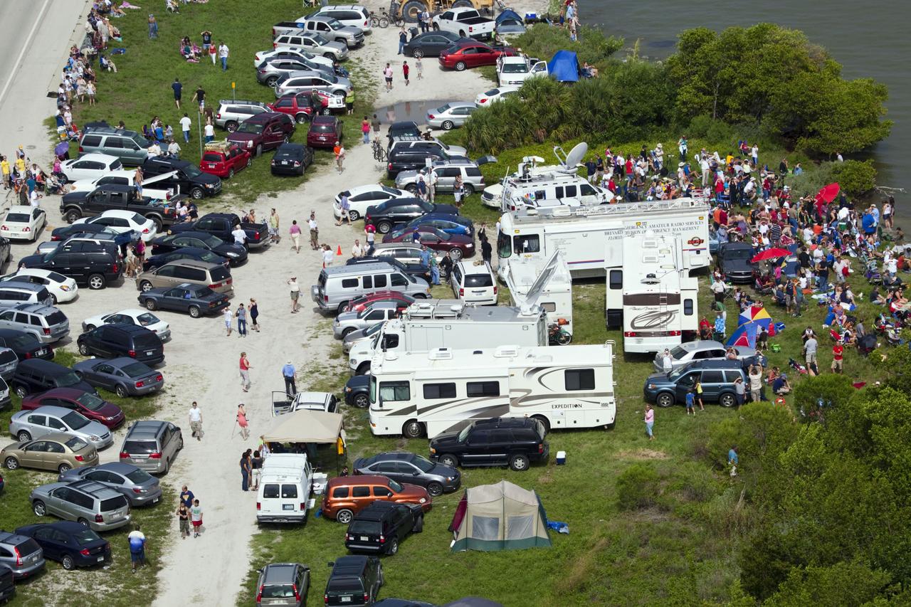 CAPE CANAVERAL, Fla. -- After 30 years and 135 missions, residents and visitors to Florida's Space Coast flock to viewing sites near Port Canaveral to see the rocket's red glare of NASA's Space Shuttle Program soar for the last time. Space shuttle Atlantis is scheduled to liftoff at 11:26 a.m. EDT from Launch Pad 39A at NASA's Kennedy Space Center in Florida. On board will be four experienced astronauts -- STS-135 Commander Chris Ferguson, Pilot Doug Hurley, and Mission Specialists Sandy Magnus and Rex Walheim.        STS-135 will deliver the Raffaello multi-purpose logistics module packed with supplies and spare parts for the International Space Station. Atlantis also will fly the Robotic Refueling Mission experiment that will investigate the potential for robotically refueling existing satellites in orbit. In addition, Atlantis will return with a failed ammonia pump module to help NASA better understand the failure mechanism and improve pump designs for future systems. STS-135 will be the 33rd flight of Atlantis, the 37th shuttle mission to the space station, and the 135th and final mission of NASA's Space Shuttle Program. For more information visit, www.nasa.gov/mission_pages/shuttle/shuttlemissions/sts135/index.html. Photo credit: NASA/Frank Michaux