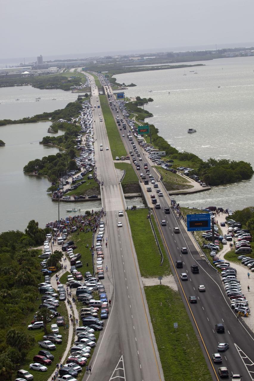 CAPE CANAVERAL, Fla. -- After 30 years and 135 missions, residents and visitors to Florida's Space Coast flock to viewing sites near Port Canaveral to see the rocket's red glare of NASA's Space Shuttle Program soar for the last time. Space shuttle Atlantis is scheduled to liftoff at 11:26 a.m. EDT from Launch Pad 39A at NASA's Kennedy Space Center in Florida. On board will be four experienced astronauts -- STS-135 Commander Chris Ferguson, Pilot Doug Hurley, and Mission Specialists Sandy Magnus and Rex Walheim.      STS-135 will deliver the Raffaello multi-purpose logistics module packed with supplies and spare parts for the International Space Station. Atlantis also will fly the Robotic Refueling Mission experiment that will investigate the potential for robotically refueling existing satellites in orbit. In addition, Atlantis will return with a failed ammonia pump module to help NASA better understand the failure mechanism and improve pump designs for future systems. STS-135 will be the 33rd flight of Atlantis, the 37th shuttle mission to the space station, and the 135th and final mission of NASA's Space Shuttle Program. For more information visit, www.nasa.gov/mission_pages/shuttle/shuttlemissions/sts135/index.html. Photo credit: NASA/Frank Michaux
