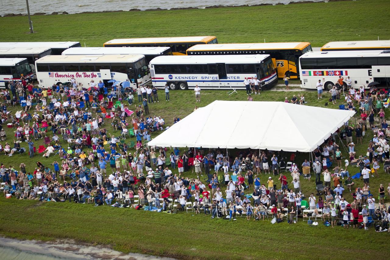 CAPE CANAVERAL, Fla. -- After 30 years and 135 missions, invited guests congregate along the NASA Causeway to see the rocket's red glare of NASA's Space Shuttle Program soar for the last time. Space shuttle Atlantis is scheduled to liftoff at 11:26 a.m. EDT from Launch Pad 39A at NASA's Kennedy Space Center in Florida. On board will be four experienced astronauts -- STS-135 Commander Chris Ferguson, Pilot Doug Hurley, and Mission Specialists Sandy Magnus and Rex Walheim.      STS-135 will deliver the Raffaello multi-purpose logistics module packed with supplies and spare parts for the International Space Station. Atlantis also will fly the Robotic Refueling Mission experiment that will investigate the potential for robotically refueling existing satellites in orbit. In addition, Atlantis will return with a failed ammonia pump module to help NASA better understand the failure mechanism and improve pump designs for future systems. STS-135 will be the 33rd flight of Atlantis, the 37th shuttle mission to the space station, and the 135th and final mission of NASA's Space Shuttle Program. For more information visit, www.nasa.gov/mission_pages/shuttle/shuttlemissions/sts135/index.html. Photo credit: NASA/Frank Michaux