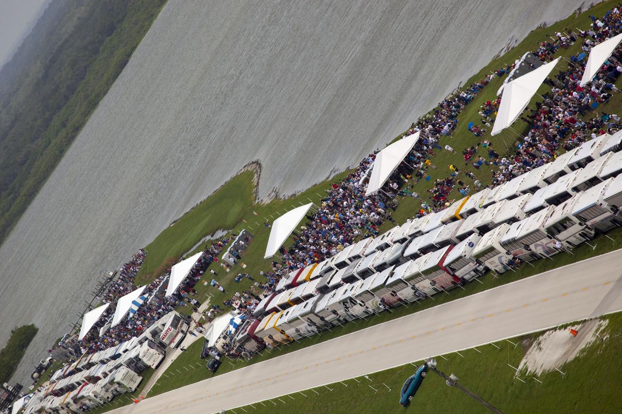 CAPE CANAVERAL, Fla. -- After 30 years and 135 missions, invited guests congregate along the NASA Causeway to see the rocket's red glare of NASA's Space Shuttle Program soar for the last time. Space shuttle Atlantis is scheduled to liftoff at 11:26 a.m. EDT from Launch Pad 39A at NASA's Kennedy Space Center in Florida. On board will be four experienced astronauts -- STS-135 Commander Chris Ferguson, Pilot Doug Hurley, and Mission Specialists Sandy Magnus and Rex Walheim.    STS-135 will deliver the Raffaello multi-purpose logistics module packed with supplies and spare parts for the International Space Station. Atlantis also will fly the Robotic Refueling Mission experiment that will investigate the potential for robotically refueling existing satellites in orbit. In addition, Atlantis will return with a failed ammonia pump module to help NASA better understand the failure mechanism and improve pump designs for future systems. STS-135 will be the 33rd flight of Atlantis, the 37th shuttle mission to the space station, and the 135th and final mission of NASA's Space Shuttle Program. For more information visit, www.nasa.gov/mission_pages/shuttle/shuttlemissions/sts135/index.html. Photo credit: NASA/Frank Michaux