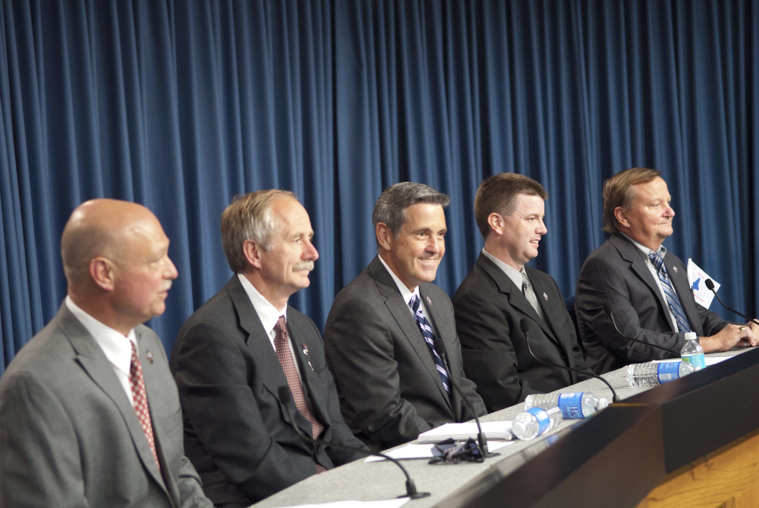 CAPE CANAVERAL, Fla. -- Members of the media gather for a post-launch news conference held in the Press Site auditorium at NASA's Kennedy Space Center in Florida, following the successful launch of space shuttle Atlantis on its STS-135 mission to the International Space Station. Seen here are NASA Public Affairs Officer Mike Curie (left) moderator; Associate Administrator for Space Operations Bill Gerstenmaier, Kennedy Center Director Bob Cabana, Shuttle Program Launch Integration Manager Mike Moses, and Shuttle Launch Director Mike Leinbach.          Atlantis began its final flight at 11:29 a.m. EDT on July 8. STS-135 will deliver the Raffaello multi-purpose logistics module packed with supplies and spare parts for the International Space Station. Atlantis also will fly the Robotic Refueling Mission experiment that will investigate the potential for robotically refueling existing satellites in orbit. In addition, Atlantis will return with a failed ammonia pump module to help NASA better understand the failure mechanism and improve pump designs for future systems. STS-135 will be the 33rd flight of Atlantis, the 37th shuttle mission to the space station, and the 135th and final mission of NASA's Space Shuttle Program. For more information, visit www.nasa.gov/mission_pages/shuttle/shuttlemissions/sts135/index.html. Photo credit: NASA/Jim Grossmann
