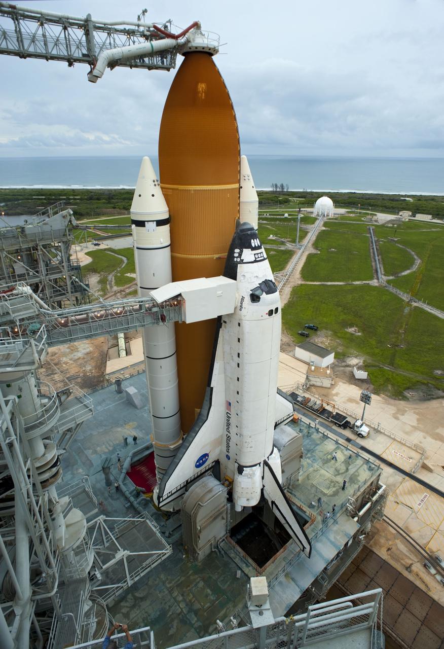 CAPE CANAVERAL, Fla. -- Space shuttle Atlantis, secured atop a mobile launcher platform, is moments from liftoff from Launch Pad 39A, overlooking the Atlantic Ocean at NASA's Kennedy Space Center in Florida.  Atlantis began its final flight, the STS-135 mission to the International Space Station, at 11:29 a.m. EDT July 8.    STS-135 will deliver the Raffaello multi-purpose logistics module packed with supplies and spare parts to the orbiting laboratory. Atlantis also is flying the Robotic Refueling Mission experiment that will investigate the potential for robotically refueling existing satellites in orbit. In addition, a failed ammonia pump module will be returned to Earth aboard Atlantis to help NASA better understand the failure mechanism and improve pump designs for future systems. STS-135 is the 33rd flight of Atlantis, the 37th shuttle mission to the space station, and the 135th and final mission of NASA's Space Shuttle Program. For more information, visit www.nasa.gov/mission_pages/shuttle/shuttlemissions/sts135/index.html. Photo credit: NASA/Tony Gray and Tom Farrar