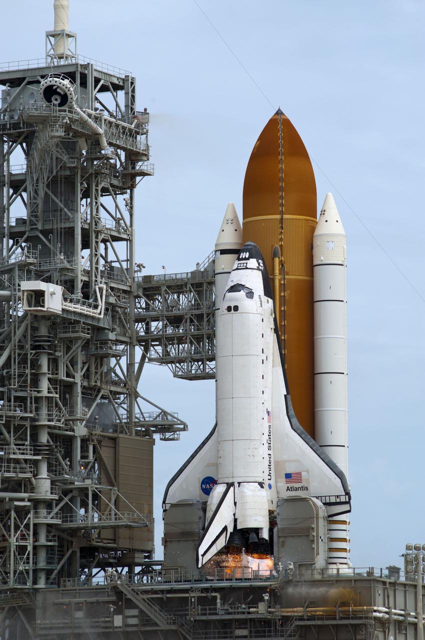 CAPE CANAVERAL, Fla. -- At NASA's Kennedy Space Center in Florida, space shuttle Atlantis' main engines ignite on Launch Pad 39A as it lifts off on its STS-135 mission to the International Space Station.        Atlantis with its crew of four; Commander Chris Ferguson, Pilot Doug Hurley, Mission Specialists Sandy Magnus and Rex Walheim, lifted off at 11:29 a.m. EDT on July 8, 2011 to deliver the Raffaello multi-purpose logistics module packed with supplies and spare parts for the station. Atlantis also will fly the Robotic Refueling Mission experiment that will investigate the potential for robotically refueling existing satellites in orbit. In addition, Atlantis will return with a failed ammonia pump module to help NASA better understand the failure mechanism and improve pump designs for future systems. STS-135 is the 33rd flight of Atlantis, the 37th shuttle mission to the space station, and the 135th and final mission of NASA's Space Shuttle Program. For more information, visit www.nasa.gov/mission_pages/shuttle/shuttlemissions/sts135/index.html. Photo credit: NASA/Sandra Joseph and Kevin O'Connell