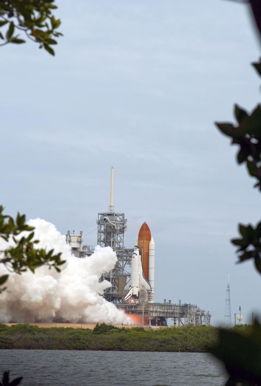 CAPE CANAVERAL, Fla. -- At NASA's Kennedy Space Center in Florida, space shuttle Atlantis' main engines and solid rocket boosters ignite on Launch Pad 39A leaving behind billows of steam and smoke as it lifts off on its STS-135 mission to the International Space Station. Atlantis with its crew of four; Commander Chris Ferguson, Pilot Doug Hurley, Mission Specialists Sandy Magnus and Rex Walheim, lifted off at 11:29 a.m. EDT on July 8, 2011 to deliver the Raffaello multi-purpose logistics module packed with supplies and spare parts for the International Space Station. Atlantis also will fly the Robotic Refueling Mission experiment that will investigate the potential for robotically refueling existing satellites in orbit. In addition, Atlantis will return with a failed ammonia pump module to help NASA better understand the failure mechanism and improve pump designs for future systems. STS-135 is the 33rd flight of Atlantis, the 37th shuttle mission to the space station, and the 135th and final mission of NASA's Space Shuttle Program. For more information, visit www.nasa.gov/mission_pages/shuttle/shuttlemissions/sts135/index.html. Photo credit: NASA/Sandra Joseph and Kevin O'Connell