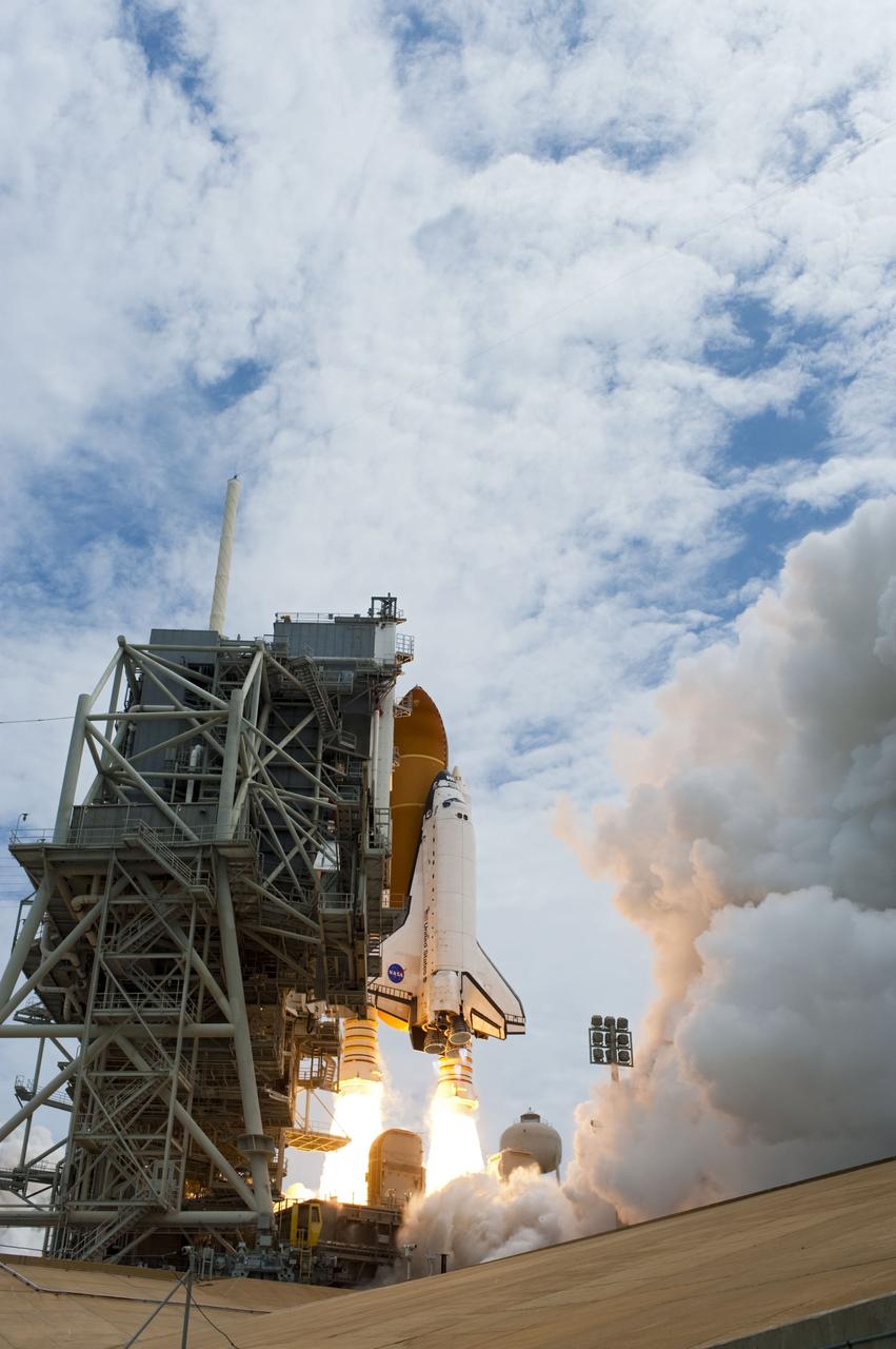 CAPE CANAVERAL, Fla. -- At NASA's Kennedy Space Center in Florida, space shuttle Atlantis' main engines and solid rocket boosters ignite on Launch Pad 39A leaving behind a billow of steam as it lifts off on its STS-135 mission to the International Space Station. Atlantis with its crew of four; Commander Chris Ferguson, Pilot Doug Hurley, Mission Specialists Sandy Magnus and Rex Walheim, lifted off at 11:29 a.m. EDT on July 8, 2011 to deliver the Raffaello multi-purpose logistics module packed with supplies and spare parts for the International Space Station. Atlantis also will fly the Robotic Refueling Mission experiment that will investigate the potential for robotically refueling existing satellites in orbit. In addition, Atlantis will return with a failed ammonia pump module to help NASA better understand the failure mechanism and improve pump designs for future systems. STS-135 is the 33rd flight of Atlantis, the 37th shuttle mission to the space station, and the 135th and final mission of NASA's Space Shuttle Program. For more information, visit www.nasa.gov/mission_pages/shuttle/shuttlemissions/sts135/index.html. Photo credit: NASA/Sandra Joseph and Kevin O'Connell
