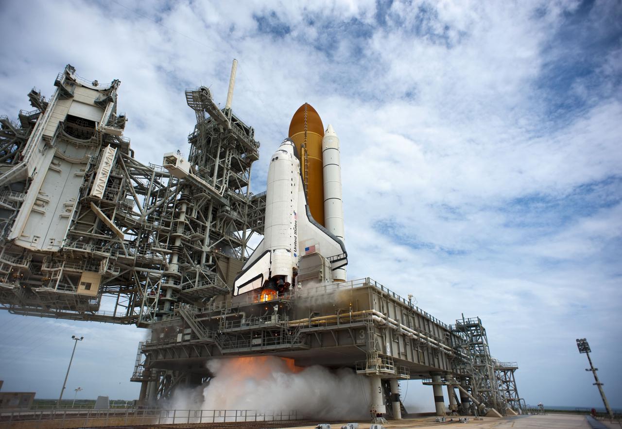 CAPE CANAVERAL, Fla. -- At NASA's Kennedy Space Center in Florida, space shuttle Atlantis' engines and solid rocket boosters ignite on Launch Pad 39A as it begins to lift off on its STS-135 mission to the International Space Station.        Atlantis with its crew of four; Commander Chris Ferguson, Pilot Doug Hurley, Mission Specialists Sandy Magnus and Rex Walheim, lifted off at 11:29 a.m. EDT on July 8, 2011 to deliver the Raffaello multi-purpose logistics module packed with supplies and spare parts for the station. Atlantis also will fly the Robotic Refueling Mission experiment that will investigate the potential for robotically refueling existing satellites in orbit. In addition, Atlantis will return with a failed ammonia pump module to help NASA better understand the failure mechanism and improve pump designs for future systems. STS-135 is the 33rd flight of Atlantis, the 37th shuttle mission to the space station, and the 135th and final mission of NASA's Space Shuttle Program. For more information, visit www.nasa.gov/mission_pages/shuttle/shuttlemissions/sts135/index.html. Photo credit: NASA/Tony Gray and Tom Farrar