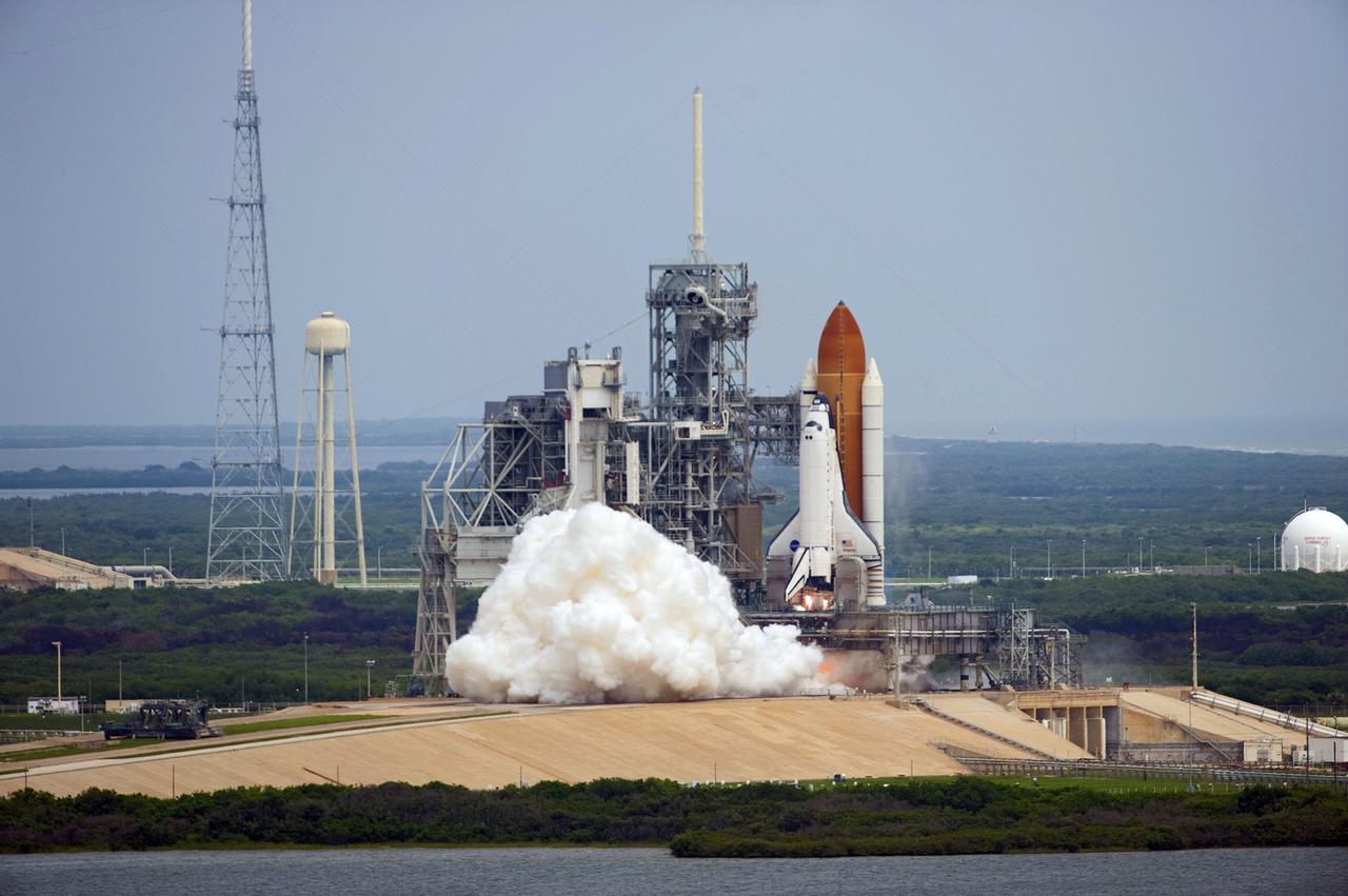 CAPE CANAVERAL, Fla. -- At NASA's Kennedy Space Center in Florida, space shuttle Atlantis' main engines and solid rocket boosters ignite on Launch Pad 39A leaving behind a billow of steam as it lifts off on its STS-135 mission to the International Space Station. Atlantis with its crew of four; Commander Chris Ferguson, Pilot Doug Hurley, Mission Specialists Sandy Magnus and Rex Walheim, lifted off at 11:29 a.m. EDT on July 8, 2011 to deliver the Raffaello multi-purpose logistics module packed with supplies and spare parts for the International Space Station. Atlantis also will fly the Robotic Refueling Mission experiment that will investigate the potential for robotically refueling existing satellites in orbit. In addition, Atlantis will return with a failed ammonia pump module to help NASA better understand the failure mechanism and improve pump designs for future systems. STS-135 is the 33rd flight of Atlantis, the 37th shuttle mission to the space station, and the 135th and final mission of NASA's Space Shuttle Program. For more information, visit www.nasa.gov/mission_pages/shuttle/shuttlemissions/sts135/index.html. Photo credit: NASA/Tony Gray and Kevin O'Connell