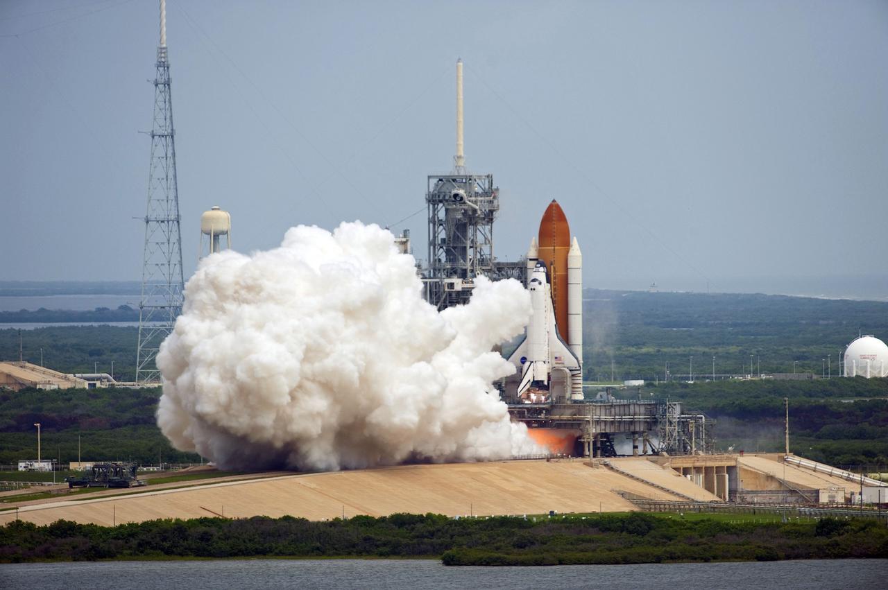 CAPE CANAVERAL, Fla. -- At NASA's Kennedy Space Center in Florida, space shuttle Atlantis' main engines and solid rocket boosters ignite on Launch Pad 39A leaving behind a billow of steam as it lifts off on its STS-135 mission to the International Space Station. Atlantis with its crew of four; Commander Chris Ferguson, Pilot Doug Hurley, Mission Specialists Sandy Magnus and Rex Walheim, lifted off at 11:29 a.m. EDT on July 8, 2011 to deliver the Raffaello multi-purpose logistics module packed with supplies and spare parts for the International Space Station. Atlantis also will fly the Robotic Refueling Mission experiment that will investigate the potential for robotically refueling existing satellites in orbit. In addition, Atlantis will return with a failed ammonia pump module to help NASA better understand the failure mechanism and improve pump designs for future systems. STS-135 is the 33rd flight of Atlantis, the 37th shuttle mission to the space station, and the 135th and final mission of NASA's Space Shuttle Program. For more information, visit www.nasa.gov/mission_pages/shuttle/shuttlemissions/sts135/index.html. Photo credit: NASA/Tony Gray and Kevin O'Connell