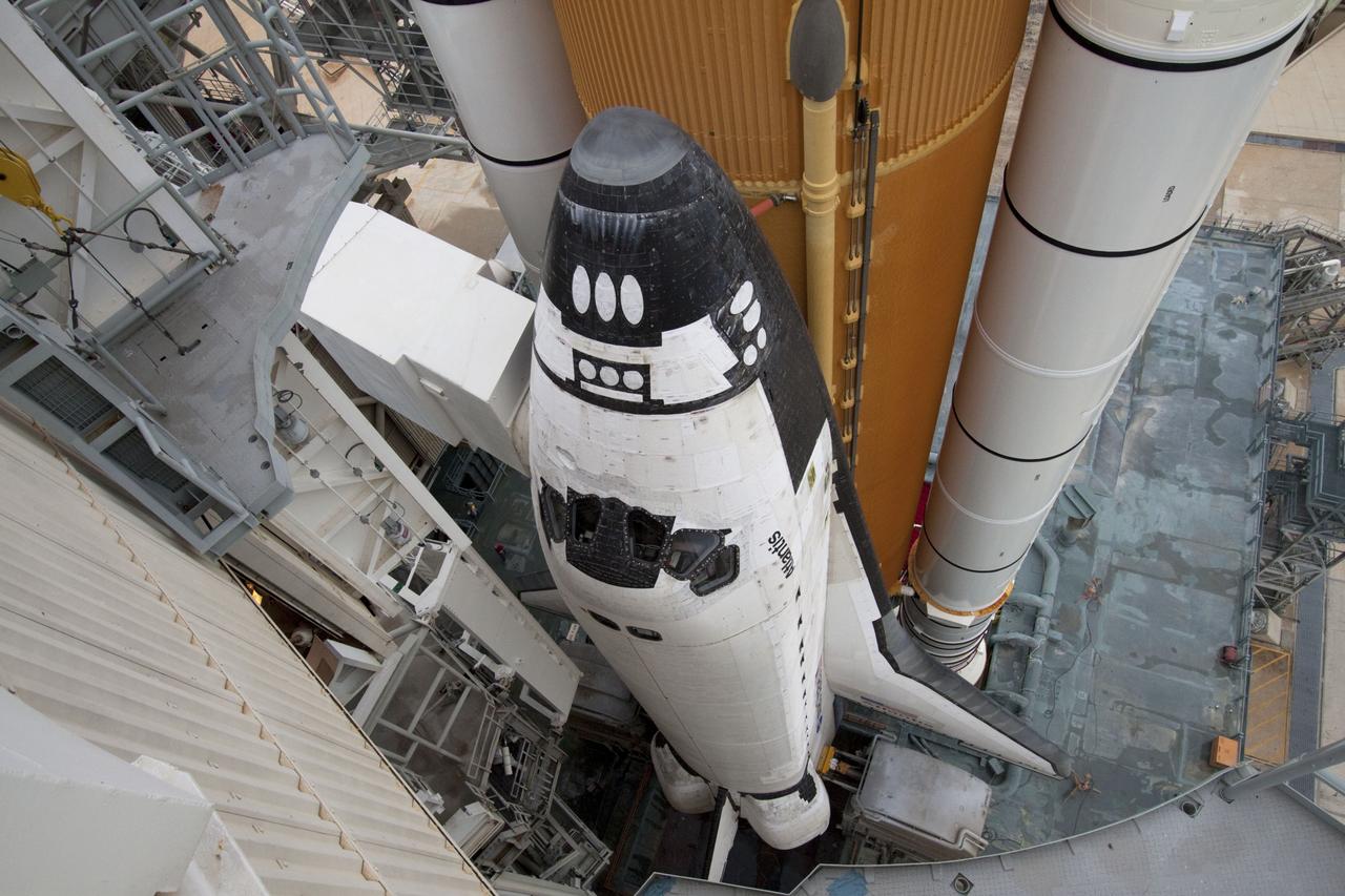 CAPE CANAVERAL, Fla. -- Space shuttle Atlantis is revealed on Launch Pad 39A at NASA's Kennedy Space Center in Florida following the move of the rotating service structure (RSS). The structure provides weather protection and access to the shuttle while it awaits liftoff on the pad. RSS "rollback" marks a major milestone in Atlantis' STS-135 mission countdown. Atlantis and its crew of four; Commander Chris Ferguson, Pilot Doug Hurley and Mission Specialists Sandy Magnus and Rex Walheim, are scheduled to lift off at 11:26 a.m. EDT on July 8 to deliver the Raffaello multi-purpose logistics module packed with supplies and spare parts to the International Space Station. Atlantis also will fly the Robotic Refueling Mission experiment that will investigate the potential for robotically refueling existing satellites in orbit. In addition, Atlantis will return with a failed ammonia pump module to help NASA better understand the failure mechanism and improve pump designs for future systems. STS-135 will be the 33rd flight of Atlantis, the 37th shuttle mission to the space station, and the 135th and final mission of NASA's Space Shuttle Program. For more information visit, www.nasa.gov/mission_pages/shuttle/shuttlemissions/sts135/index.html. Photo credit: NASA/Ken Thornsley