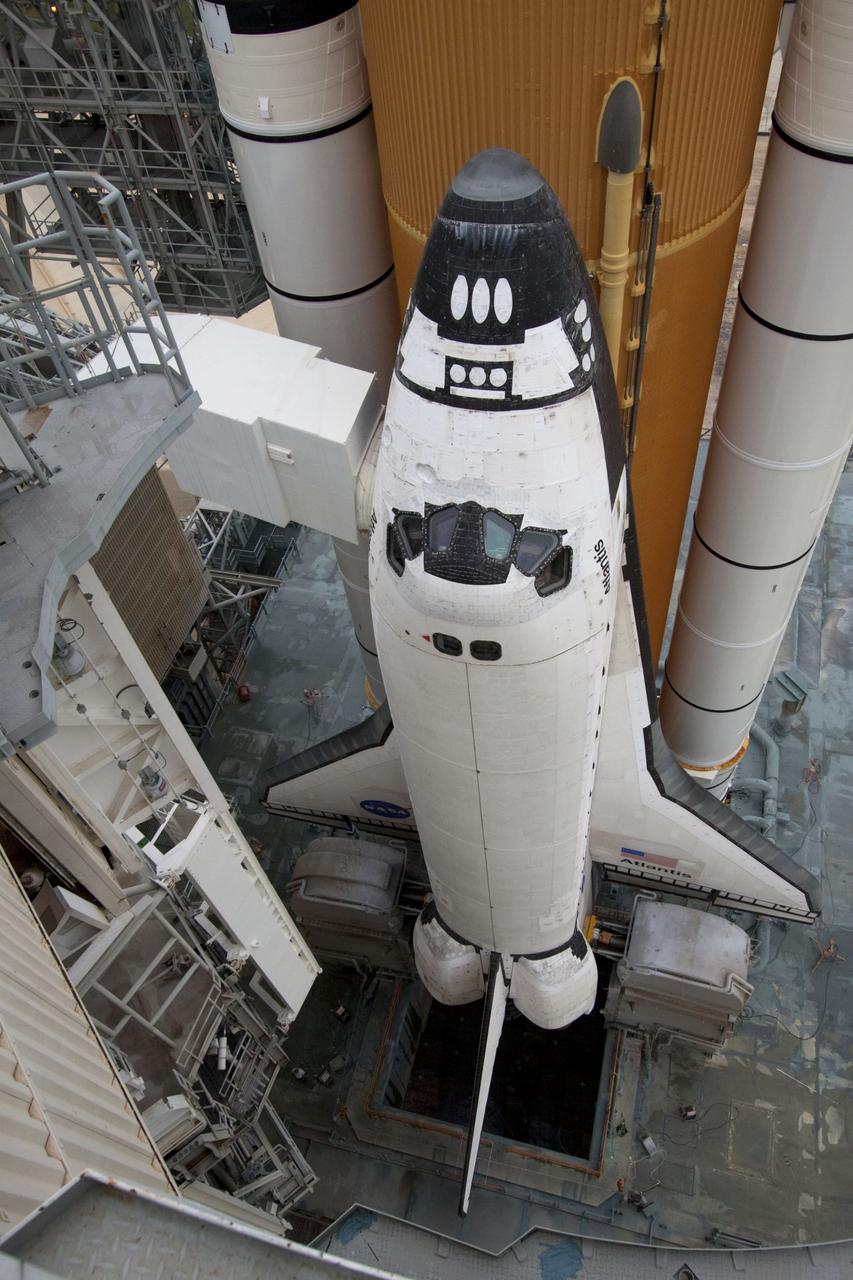 CAPE CANAVERAL, Fla. -- Space shuttle Atlantis is revealed on Launch Pad 39A at NASA's Kennedy Space Center in Florida following the move of the rotating service structure (RSS). The structure provides weather protection and access to the shuttle while it awaits liftoff on the pad. RSS "rollback" marks a major milestone in Atlantis' STS-135 mission countdown. Atlantis and its crew of four; Commander Chris Ferguson, Pilot Doug Hurley and Mission Specialists Sandy Magnus and Rex Walheim, are scheduled to lift off at 11:26 a.m. EDT on July 8 to deliver the Raffaello multi-purpose logistics module packed with supplies and spare parts to the International Space Station. Atlantis also will fly the Robotic Refueling Mission experiment that will investigate the potential for robotically refueling existing satellites in orbit. In addition, Atlantis will return with a failed ammonia pump module to help NASA better understand the failure mechanism and improve pump designs for future systems. STS-135 will be the 33rd flight of Atlantis, the 37th shuttle mission to the space station, and the 135th and final mission of NASA's Space Shuttle Program. For more information visit, www.nasa.gov/mission_pages/shuttle/shuttlemissions/sts135/index.html. Photo credit: NASA/Ken Thornsley