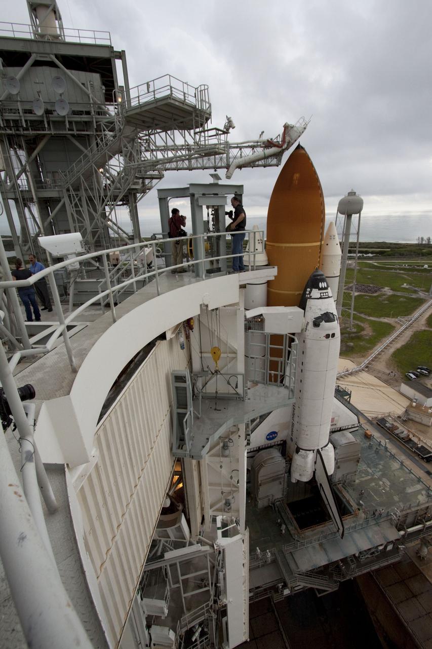 CAPE CANAVERAL, Fla. -- Space shuttle Atlantis is revealed on Launch Pad 39A at NASA's Kennedy Space Center in Florida following the move of the rotating service structure (RSS). The structure provides weather protection and access to the shuttle while it awaits liftoff on the pad. RSS "rollback" marks a major milestone in Atlantis' STS-135 mission countdown. Atlantis and its crew of four; Commander Chris Ferguson, Pilot Doug Hurley and Mission Specialists Sandy Magnus and Rex Walheim, are scheduled to lift off at 11:26 a.m. EDT on July 8 to deliver the Raffaello multi-purpose logistics module packed with supplies and spare parts to the International Space Station. Atlantis also will fly the Robotic Refueling Mission experiment that will investigate the potential for robotically refueling existing satellites in orbit. In addition, Atlantis will return with a failed ammonia pump module to help NASA better understand the failure mechanism and improve pump designs for future systems. STS-135 will be the 33rd flight of Atlantis, the 37th shuttle mission to the space station, and the 135th and final mission of NASA's Space Shuttle Program. For more information visit, www.nasa.gov/mission_pages/shuttle/shuttlemissions/sts135/index.html. Photo credit: NASA/Ken Thornsley