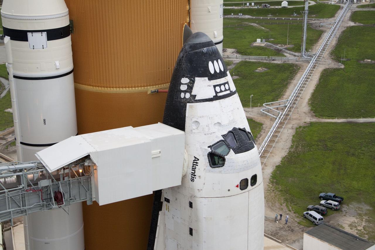 CAPE CANAVERAL, Fla. -- Space shuttle Atlantis is revealed on Launch Pad 39A at NASA's Kennedy Space Center in Florida following the move of the rotating service structure (RSS). The structure provides weather protection and access to the shuttle while it awaits liftoff on the pad. RSS "rollback" marks a major milestone in Atlantis' STS-135 mission countdown. Atlantis and its crew of four; Commander Chris Ferguson, Pilot Doug Hurley and Mission Specialists Sandy Magnus and Rex Walheim, are scheduled to lift off at 11:26 a.m. EDT on July 8 to deliver the Raffaello multi-purpose logistics module packed with supplies and spare parts to the International Space Station. Atlantis also will fly the Robotic Refueling Mission experiment that will investigate the potential for robotically refueling existing satellites in orbit. In addition, Atlantis will return with a failed ammonia pump module to help NASA better understand the failure mechanism and improve pump designs for future systems. STS-135 will be the 33rd flight of Atlantis, the 37th shuttle mission to the space station, and the 135th and final mission of NASA's Space Shuttle Program. For more information visit, www.nasa.gov/mission_pages/shuttle/shuttlemissions/sts135/index.html. Photo credit: NASA/Ken Thornsley