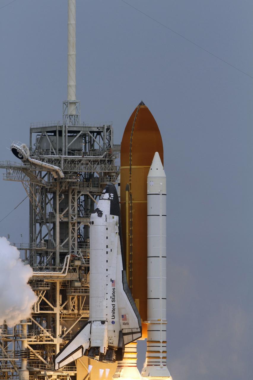 CAPE CANAVERAL, Fla. – At NASA's Kennedy Space Center in Florida, space shuttle Atlantis rises from Launch Pad 39A as it lifts off on its STS-135 mission to the International Space Station. Atlantis, with its crew of Commander Chris Ferguson, Pilot Doug Hurley, Mission Specialists Sandy Magnus and Rex Walheim, lifted off at 11:29 a.m. EDT on July 8, 2011 to deliver the Raffaello multi-purpose logistics module packed with supplies and spare parts for the station. Atlantis also will fly the Robotic Refueling Mission experiment that will investigate the potential for robotically refueling existing satellites in orbit. In addition, Atlantis will return with a failed ammonia pump module to help NASA better understand the failure mechanism and improve pump designs for future systems. STS-135 is the 33rd flight of Atlantis, the 37th shuttle mission to the space station, and the 135th and final mission of NASA's Space Shuttle Program. For more information, visit www.nasa.gov/mission_pages/shuttle/shuttlemissions/sts135/index.html. Photo credit: NASA/Kenny Allen and George Roberts