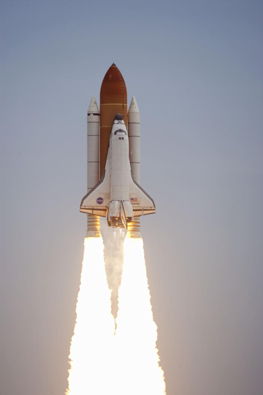 CAPE CANAVERAL, Fla. -- Space shuttle Atlantis soars from Launch Pad 39A at NASA's Kennedy Space Center in Florida on its STS-135 mission to the International Space Station. Atlantis with its crew of four; Commander Chris Ferguson, Pilot Doug Hurley, Mission Specialists Sandy Magnus and Rex Walheim, lifted off at 11:29 a.m. EDT on July 8, 2011 to deliver the Raffaello multi-purpose logistics module packed with supplies and spare parts for the International Space Station. Atlantis also will fly the Robotic Refueling Mission experiment that will investigate the potential for robotically refueling existing satellites in orbit. In addition, Atlantis will return with a failed ammonia pump module to help NASA better understand the failure mechanism and improve pump designs for future systems. STS-135 is the 33rd flight of Atlantis, the 37th shuttle mission to the space station, and the 135th and final mission of NASA's Space Shuttle Program. For more information, visit www.nasa.gov/mission_pages/shuttle/shuttlemissions/sts135/index.html. Photo credit: NASA/ Kenny Allen