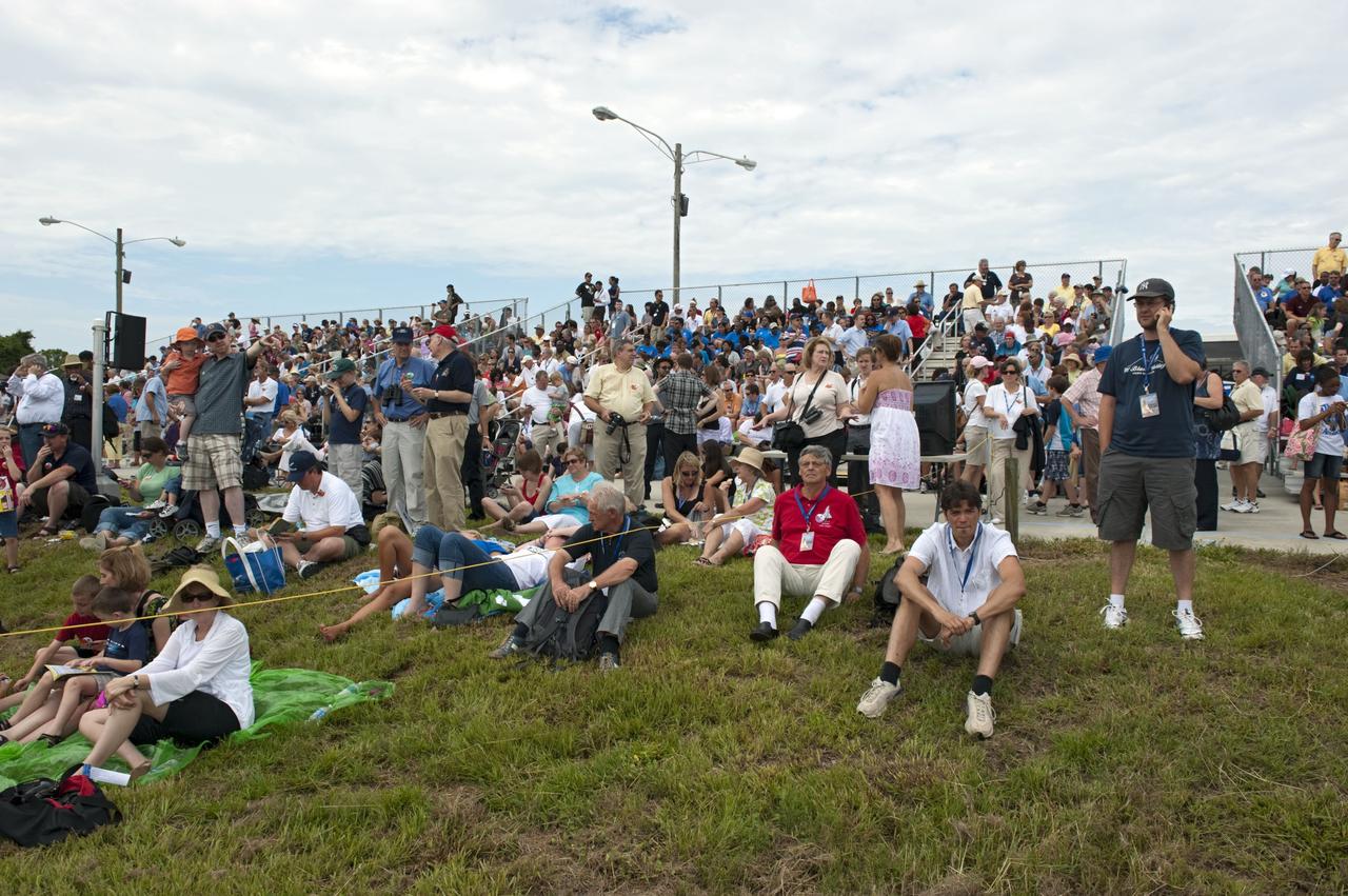 CAPE CANAVERAL, Fla. -- At the Banana River Creek VIP viewing area at NASA's Kennedy Space Center in Florida, spectators relax before the launch of space shuttle Atlantis on its STS-135 mission to the International Space Station. Atlantis with its crew of four; Commander Chris Ferguson, Pilot Doug Hurley, Mission Specialists Sandy Magnus and Rex Walheim, lifted off at 11:29 a.m. EDT on July 8, 2011 to deliver the Raffaello multi-purpose logistics module packed with supplies and spare parts for the International Space Station. Atlantis also will fly the Robotic Refueling Mission experiment that will investigate the potential for robotically refueling existing satellites in orbit. In addition, Atlantis will return with a failed ammonia pump module to help NASA better understand the failure mechanism and improve pump designs for future systems. STS-135 is the 33rd flight of Atlantis, the 37th shuttle mission to the space station, and the 135th and final mission of NASA's Space Shuttle Program. For more information, visit www.nasa.gov/mission_pages/shuttle/shuttlemissions/sts135/index.html. Photo credit: NASA/Chad Baumer