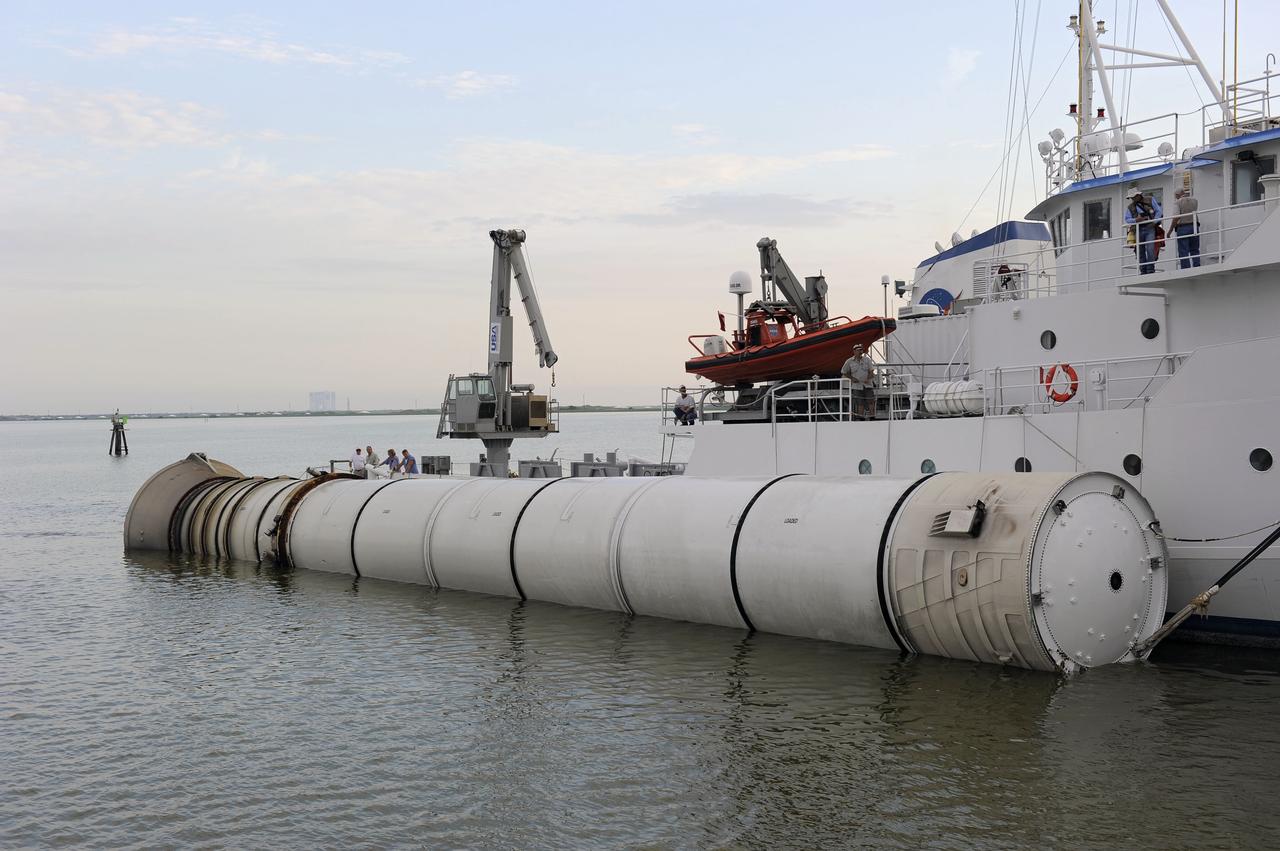 CAPE CANAVERAL, Fla. – Liberty Star, one of NASA’s solid rocket booster retrieval ships, tows a spent booster from space shuttle Atlantis’ final launch, to Port Canaveral in Florida. The shuttle’s two solid rocket booster casings and associated flight hardware are recovered in the Atlantic Ocean after every launch by Freedom Star and Liberty Star. The boosters impact the Atlantic about seven minutes after liftoff and the retrieval ships are stationed about 10 miles from the impact area at the time of splashdown.  After the spent segments are processed, they will be transported to Utah, where they will be deserviced and stored, if needed. Atlantis began its final flight, STS-135, at 11:29 a.m. EDT on July 8 to deliver the Raffaello multi-purpose logistics module packed with supplies and spare parts to the International Space Station. Photo credit: NASA/Kim Shiflett