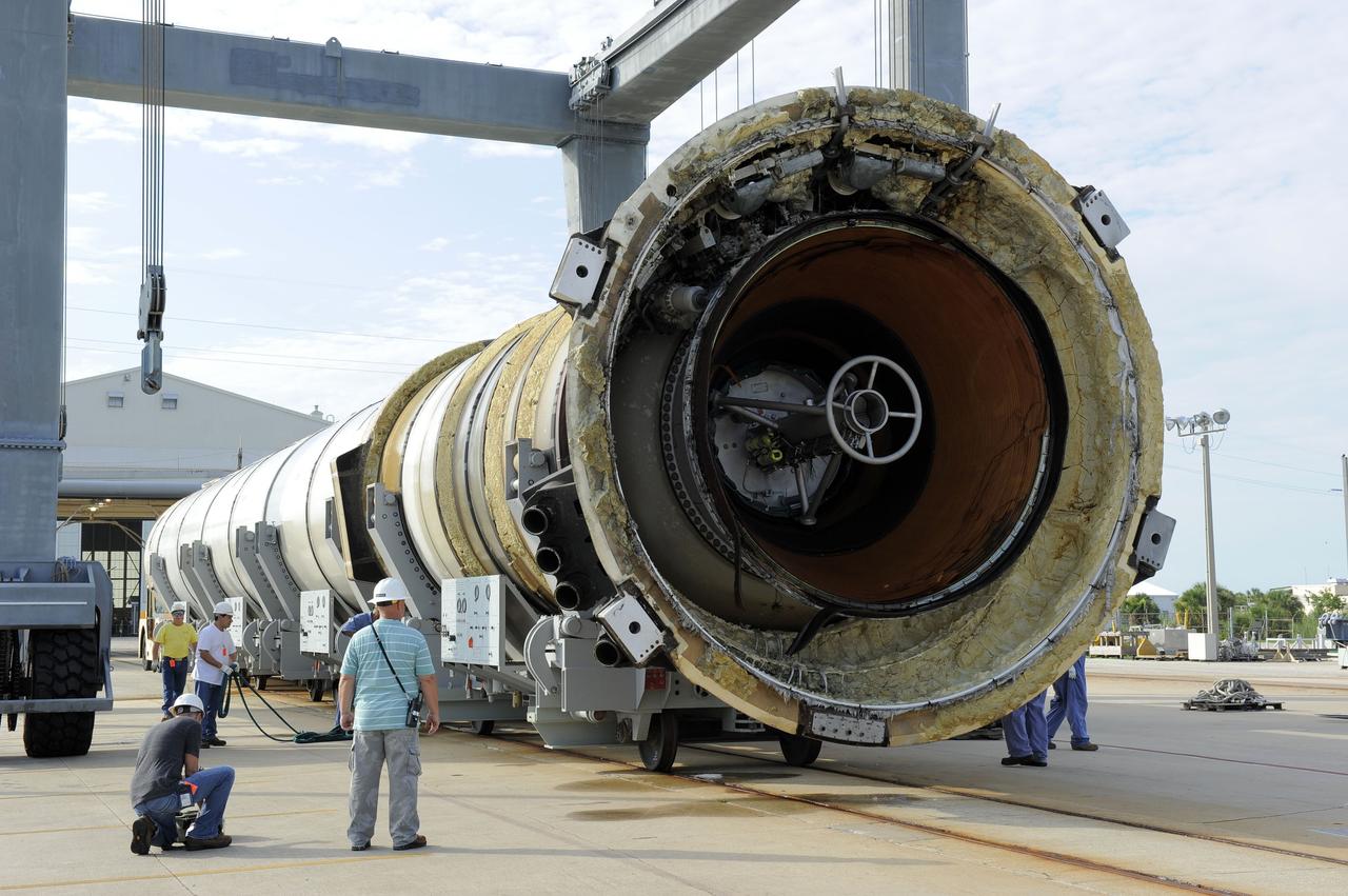 CAPE CANAVERAL, Fla. – One of two solid rocket boosters is transported to Hangar AF at Cape Canaveral Air Force Station in Florida. Liberty Star, one of NASA’s two booster retrieval ships, towed the spent booster from space shuttle Atlantis’ final launch to a mooring at Port Canaveral. The shuttle’s two solid rocket booster casings and associated flight hardware are recovered in the Atlantic Ocean after every launch by Freedom Star and Liberty Star. The boosters impact the Atlantic about seven minutes after liftoff, and the retrieval ships are stationed about 10 miles from the impact area at the time of splashdown.      After the spent segments are processed, they will be transported to Utah, where they will be deserviced and stored, if needed. Atlantis began its final flight, STS-135, at 11:29 a.m. EDT on July 8 to deliver the Raffaello multi-purpose logistics module packed with supplies and spare parts to the International Space Station. Photo credit: NASA/Kim Shiflett