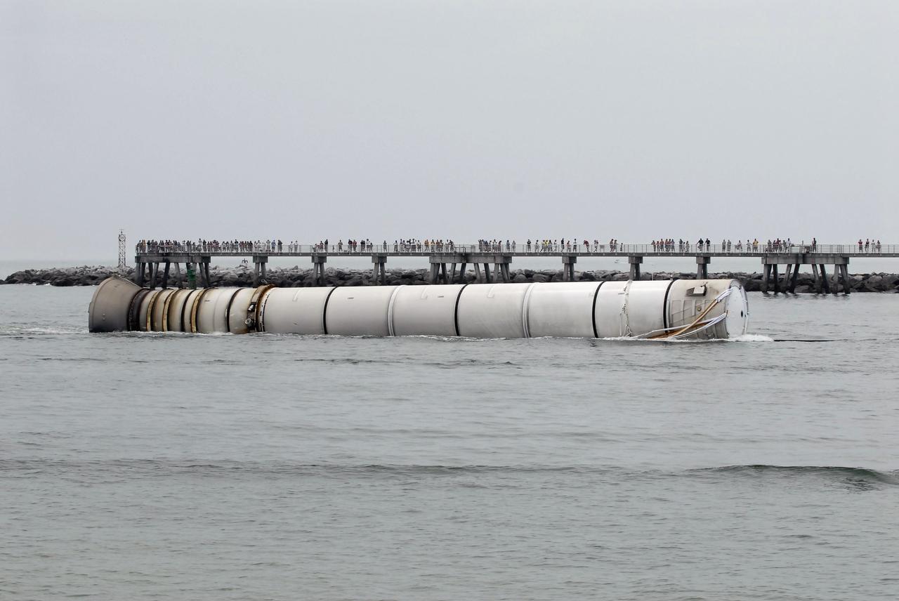 CAPE CANAVERAL, Fla. – The right spent booster from space shuttle Atlantis' final launch is towed by the Liberty Star, one of NASA's solid rocket booster retrieval ships to Port Canaveral in Florida. The shuttle's two solid rocket booster casings and associated flight hardware are recovered in the Atlantic Ocean after every launch by Freedom Star and Liberty Star. The boosters impact the Atlantic about seven minutes after liftoff and the retrieval ships are stationed about 10 miles from the impact area at the time of splashdown. After the spent segments are processed, they will be transported to Utah, where they will be deserviced and stored, if needed. Atlantis began its final flight at 11:29 a.m. EDT on July 8 to deliver the Raffaello multi-purpose logistics module packed with supplies and spare parts for the International Space Station. Atlantis also delivers the Robotic Refueling Mission experiment that will investigate the potential for robotically refueling existing satellites in orbit to the station. In addition, Atlantis will return with a failed ammonia pump module to help NASA better understand the failure mechanism and improve pump designs for future systems. STS-135 is the 33rd flight of Atlantis, the 37th shuttle mission to the space station, and the 135th and final mission of NASA's Space Shuttle Program. For more information, visit www.nasa.gov/mission_pages/shuttle/shuttlemissions/sts135/index.html. Photo credit: NASA/Kim Shiflett