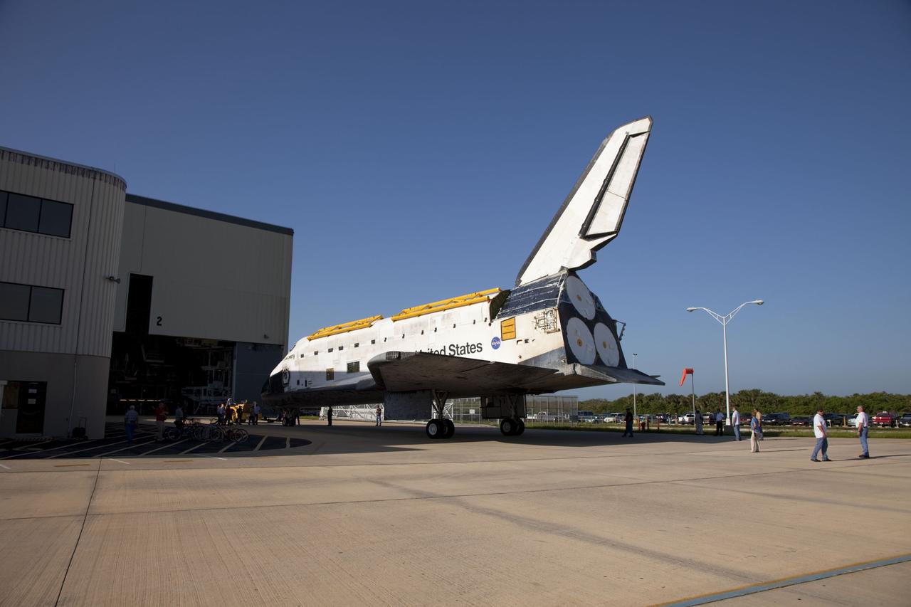 CAPE CANAVERAL, Fla. -- At NASA's Kennedy Space Center in Florida, space shuttle Discovery rolls out of Orbiter Processing Facility-2, or OPF-2, to begin the move to the Vehicle Assembly Building, or VAB. Discovery will be stored inside the VAB for approximately one month while shuttle Atlantis undergoes processing in OPF-2 following its final mission, STS-135. Discovery flew its 39th and final mission, STS-133, in February and March 2011, and currently is being prepared for public display at the Smithsonian's National Air and Space Museum Steven F. Udvar-Hazy Center in Virginia. For more information about Discovery's Transition and Retirement, visit www.nasa.gov/mission_pages/shuttle/launch/discovery_rss_collection_archive_1.html. Photo credit: NASA/Frankie Martin