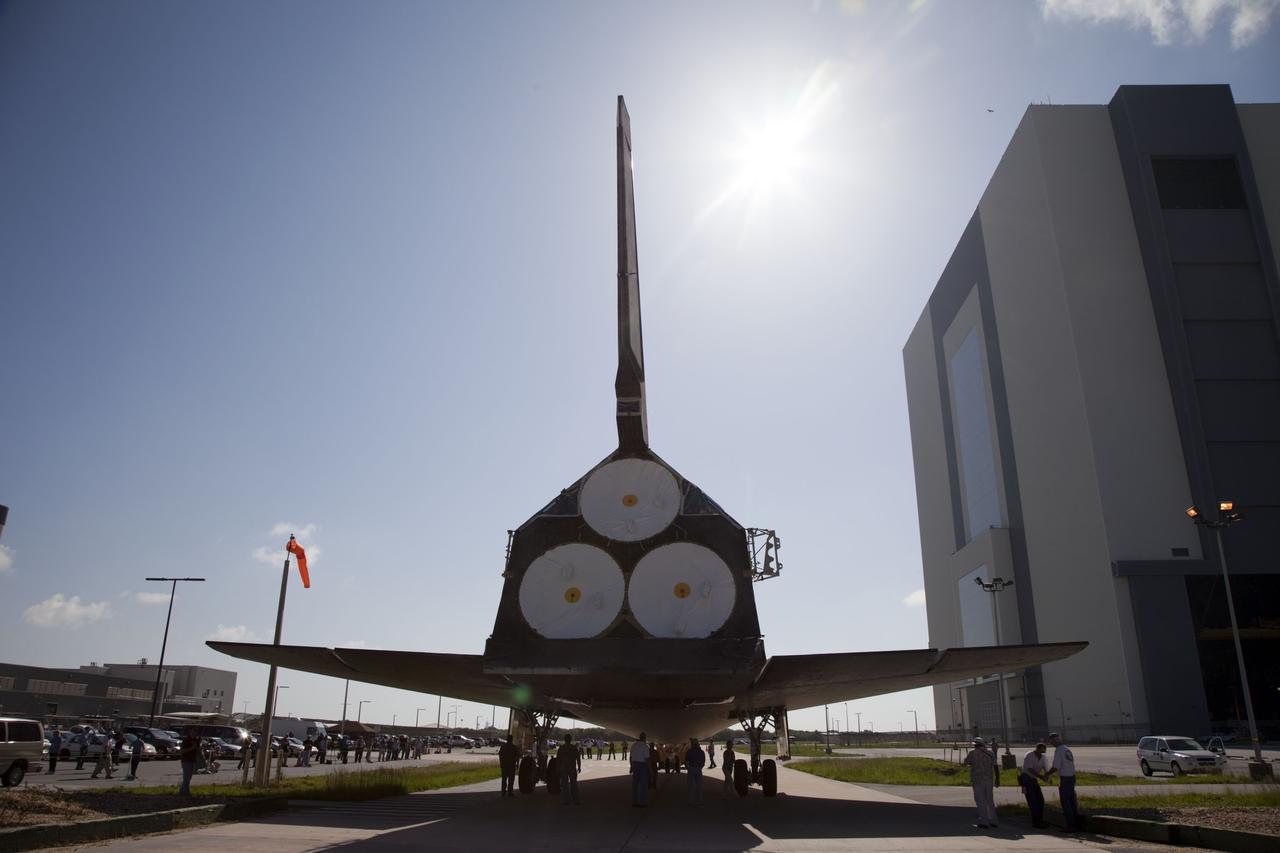 CAPE CANAVERAL, Fla. -- At NASA's Kennedy Space Center in Florida, space shuttle Discovery -- its space shuttle main engines long since removed -- approaches the Vehicle Assembly Building, or VAB, from Orbiter Processing Facility-2, or OPF-2. Discovery will be stored inside the VAB for approximately one month while shuttle Atlantis undergoes processing in OPF-2 following its final mission, STS-135. Discovery flew its 39th and final mission, STS-133, in February and March 2011, and currently is being prepared for public display at the Smithsonian's National Air and Space Museum Steven F. Udvar-Hazy Center in Virginia. For more information about Discovery's Transition and Retirement, visit www.nasa.gov/mission_pages/shuttle/launch/discovery_rss_collection_archive_1.html. Photo credit: NASA/Frankie Martin