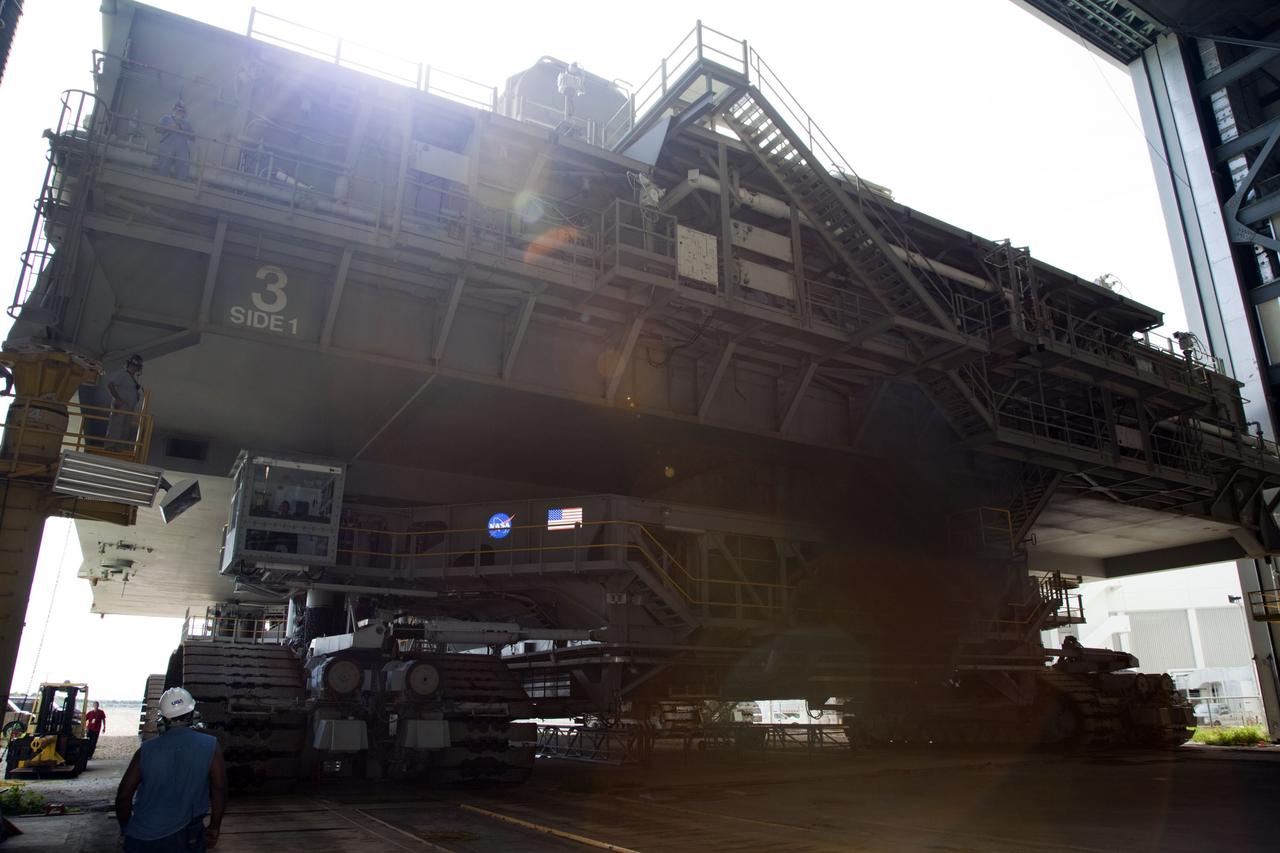 CAPE CANAVERAL, Fla. -- At NASA's Kennedy Space Center in Florida, Mobile Launcher Platform-3 (MLP), which supported space shuttle Atlantis for its final flight to the International Space Station on the STS-135 mission, has been delivered to the Vehicle Assembly Building (VAB) atop a crawler-transporter.           For more than 40 years, the MLPs have traveled between the massive VAB to both launch pads at Launch Complex 39, and then returned to the VAB for future use. MLP-3 was first used to launch Columbia on the STS-32 mission on Jan. 9, 1990. Photo credit: NASA/Frankie Martin