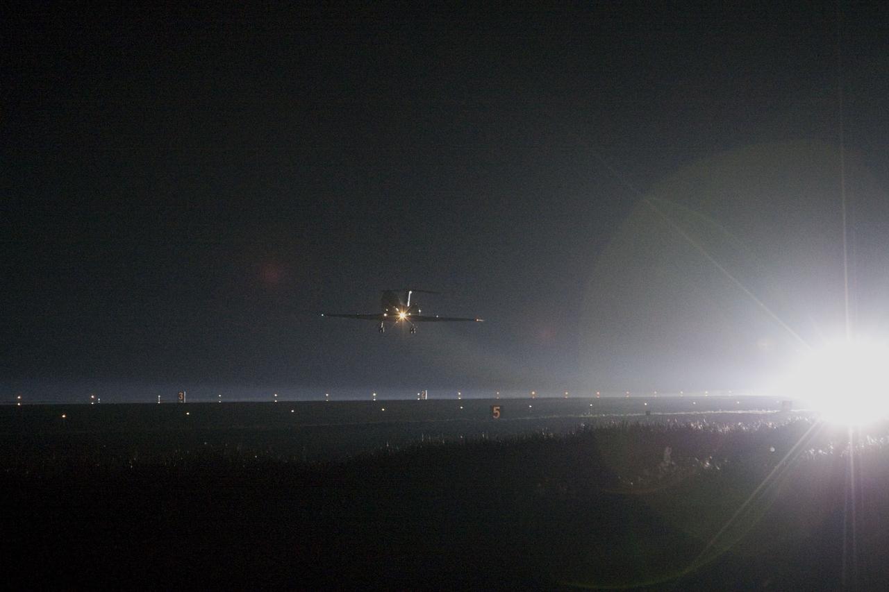 CAPE CANAVERAL, Fla. -- Deputy Chief of the Astronaut Office Rick Sturckow flies weather reconnaissance in a Shuttle Training Aircraft over NASA's Kennedy Space Center in Florida to assess the weather before space shuttle Atlantis returns to Earth for the last time. Weather was observed "go" and Atlantis touched down on Runway 15 at 5:57 a.m., bringing an end to the STS-135 mission and NASA's Space Shuttle Program.               On the 37th shuttle mission to the International Space Station, STS-135 delivered more than 9,400 pounds of spare parts, equipment and supplies in the Raffaello multi-purpose logistics module that will sustain station operations for the next year. STS-135 was the 33rd and final flight for Atlantis, which has spent 307 days in space, orbited Earth 4,848 times and traveled 125,935,769 miles. For more information visit, www.nasa.gov/mission_pages/shuttle/shuttlemissions/sts135/index.html. Photo credit: NASA/Tony Gray