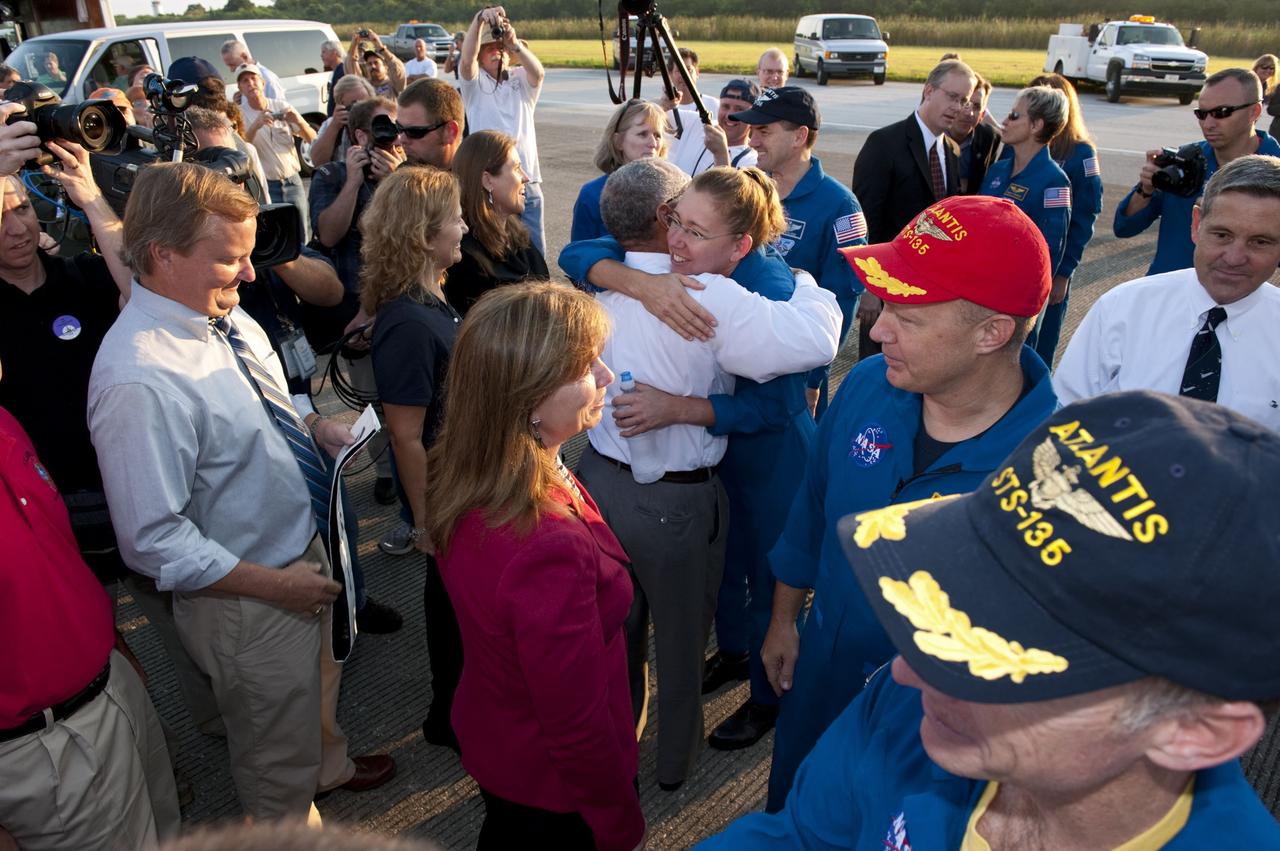 CAPE CANAVERAL, Fla. -- The STS-135 crew members are congratulated on their successful mission to the International Space Station. Four astronauts brought space shuttle Atlantis home to the Shuttle Landing Facility's Runway 15 at NASA's Kennedy Space Center in Florida at 5:57 a.m. EDT bringing a close NASA's Space Shuttle Program. Atlantis' final return from space completed a 13-day, 5.2-million-mile journey to the International Space Station.                    STS-135 delivered spare parts, equipment and supplies in the Raffaello multi-purpose logistics module that will sustain station operations for the next year. STS-135 was the 33rd and final flight for Atlantis, which has spent 307 days in space, orbited Earth 4,848 times and traveled 125,935,769 miles. For more information visit, www.nasa.gov/mission_pages/shuttle/shuttlemissions/sts135/index.html. Photo credit: NASA/Kim Shiflett
