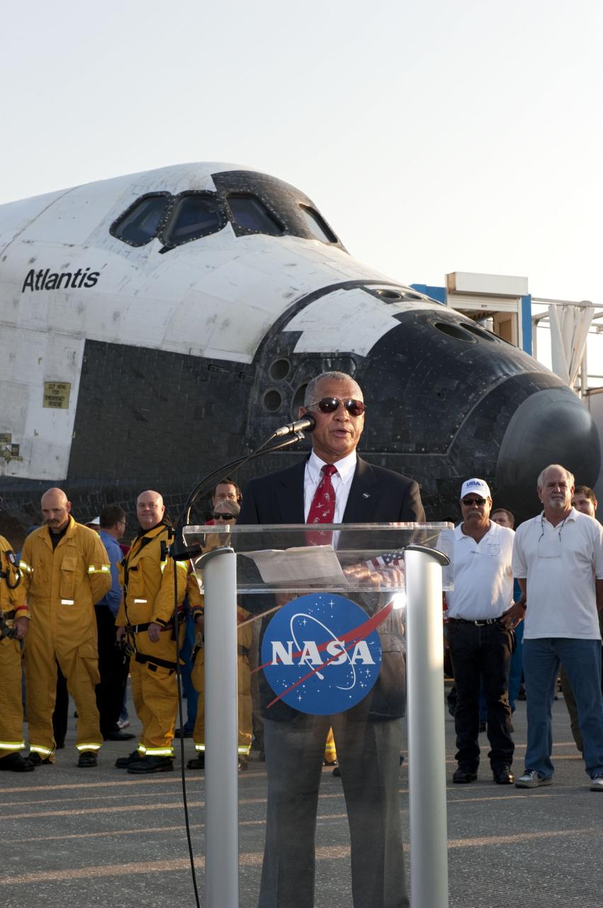 CAPE CANAVERAL, Fla. -- NASA Administrator Charlie Bolden talks about bookending the space agency's Space Shuttle Program following the successful STS-135 mission to the International Space Station. Four astronauts brought Atlantis home to the Shuttle Landing Facility's Runway 15 at NASA's Kennedy Space Center in Florida at 5:57 a.m. EDT. Atlantis' final return from space completed a 13-day, 5.2-million-mile journey to the International Space Station.          STS-135 delivered spare parts, equipment and supplies in the Raffaello multi-purpose logistics module that will sustain station operations for the next year. STS-135 was the 33rd and final flight for Atlantis, which has spent 307 days in space, orbited Earth 4,848 times and traveled 125,935,769 miles. For more information visit, www.nasa.gov/mission_pages/shuttle/shuttlemissions/sts135/index.html. Photo credit: NASA/Kim Shiflett