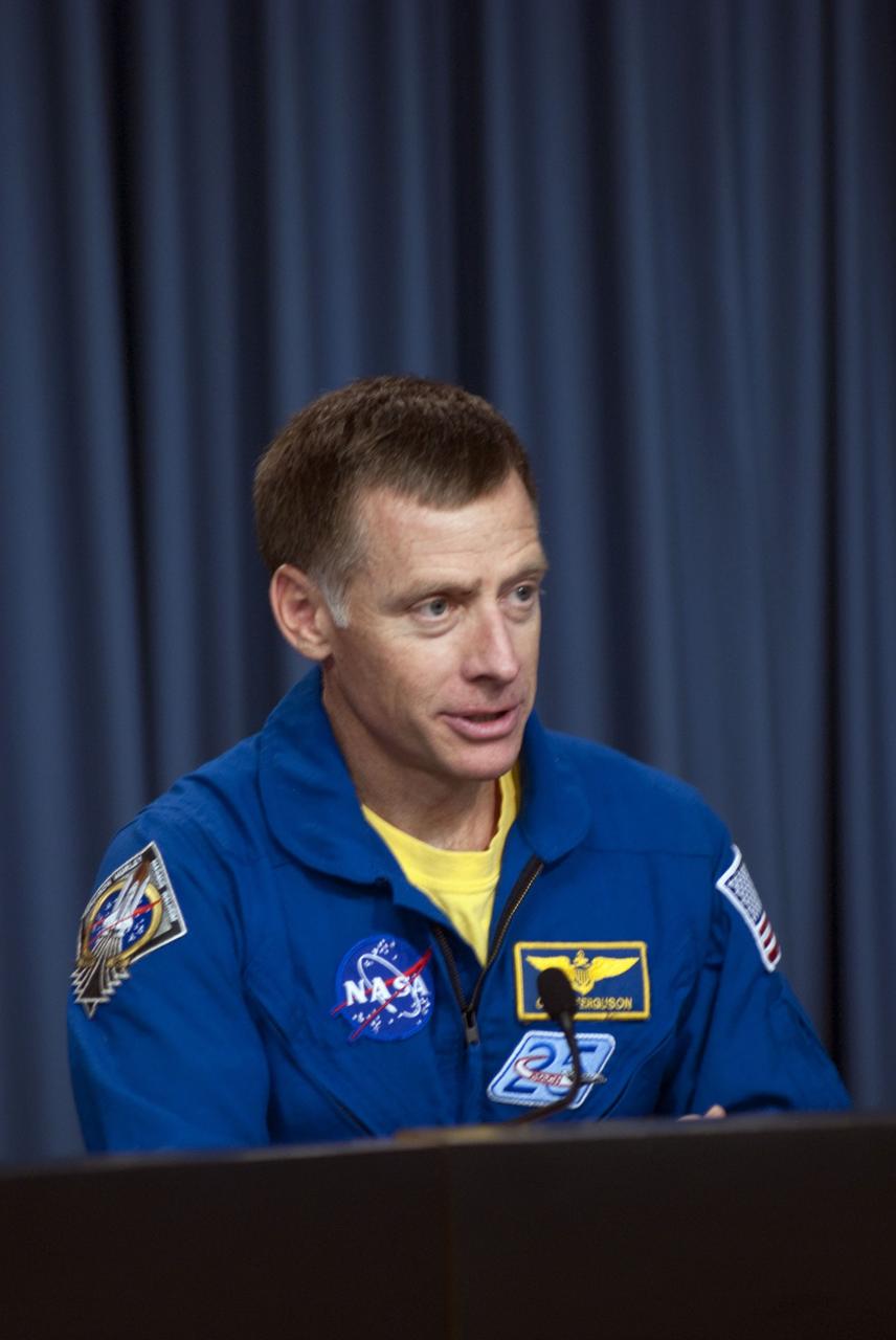 CAPE CANAVERAL, Fla. -- The crew of space shuttle Atlantis' STS-135 and final Space Shuttle Program Flight, participates in a news conference in the Press Site auditorium at NASA's Kennedy Space Center in Florida on landing day. Seen here is STS-135 Commander Chris Ferguson speaking to media.          Securing the space shuttle fleet's place in history, Atlantis marked the 26th nighttime landing of NASA's Space Shuttle Program and the 78th landing at Kennedy. Main gear touchdown was at 5:57:00 a.m. EDT, followed by nose gear touchdown at 5:57:20 a.m., and wheelstop at 5:57:54 a.m. Atlantis and its crew delivered to the International Space Station the Raffaello multi-purpose logistics module packed with  more than 9,400 pounds of spare parts, equipment and supplies that will sustain station operations for the next year. STS-135 was the 33rd and final flight for Atlantis, which has spent 307 days in space, orbited Earth 4,848 times and traveled 125,935,769 miles. For more information, visit www.nasa.gov/mission_pages/shuttle/shuttlemissions/sts135/index.html. Photo credit: NASA/Jim Grossmann