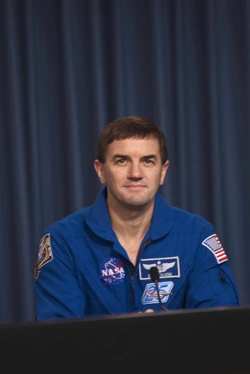 CAPE CANAVERAL, Fla. -- The crew of space shuttle Atlantis' STS-135 and final Space Shuttle Program Flight, participates in a news conference in the Press Site auditorium at NASA's Kennedy Space Center in Florida on landing day. Seen here is STS-135 Mission Specialist Rex Walheim speaking to media.      Securing the space shuttle fleet's place in history, Atlantis marked the 26th nighttime landing of NASA's Space Shuttle Program and the 78th landing at Kennedy. Main gear touchdown was at 5:57:00 a.m. EDT, followed by nose gear touchdown at 5:57:20 a.m., and wheelstop at 5:57:54 a.m. Atlantis and its crew delivered to the International Space Station the Raffaello multi-purpose logistics module packed with  more than 9,400 pounds of spare parts, equipment and supplies that will sustain station operations for the next year. STS-135 was the 33rd and final flight for Atlantis, which has spent 307 days in space, orbited Earth 4,848 times and traveled 125,935,769 miles. For more information, visit www.nasa.gov/mission_pages/shuttle/shuttlemissions/sts135/index.html. Photo credit: NASA/Jim Grossmann