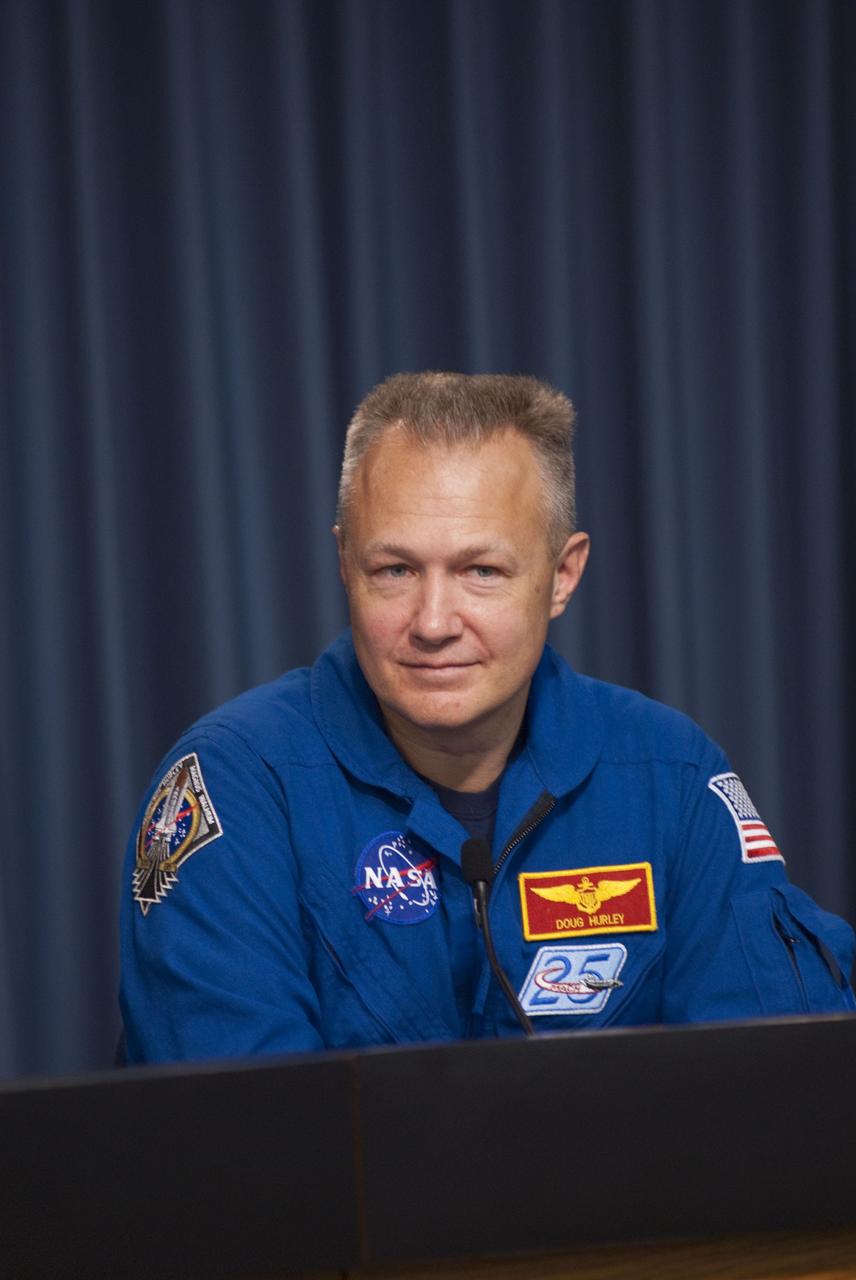 CAPE CANAVERAL, Fla. -- The crew of space shuttle Atlantis' STS-135 and final Space Shuttle Program Flight, participates in a news conference in the Press Site auditorium at NASA's Kennedy Space Center in Florida on landing day. Seen here is STS-135 Pilot Doug Hurley speaking to media.    Securing the space shuttle fleet's place in history, Atlantis marked the 26th nighttime landing of NASA's Space Shuttle Program and the 78th landing at Kennedy. Main gear touchdown was at 5:57:00 a.m. EDT, followed by nose gear touchdown at 5:57:20 a.m., and wheelstop at 5:57:54 a.m. Atlantis and its crew delivered to the International Space Station the Raffaello multi-purpose logistics module packed with  more than 9,400 pounds of spare parts, equipment and supplies that will sustain station operations for the next year. STS-135 was the 33rd and final flight for Atlantis, which has spent 307 days in space, orbited Earth 4,848 times and traveled 125,935,769 miles. For more information, visit www.nasa.gov/mission_pages/shuttle/shuttlemissions/sts135/index.html. Photo credit: NASA/Jim Grossmann