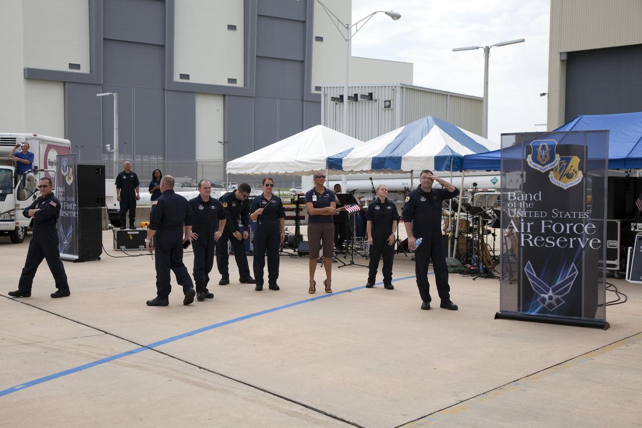 CAPE CANAVERAL, Fla. -- At NASA's Kennedy Space Center in Florida, The Band of the United States Air Force Reserve will provide the entertainment at an employee appreciation event for the thousands of workers who have processed, launched and landed America's space shuttles for more than three decades. Following the successful STS-135 mission, space shuttle Atlantis was parked at the celebration site for photo opportunities. STS-135 secured the space shuttle fleet's place in history and brought a close to NASA's Space Shuttle Program.                STS-135 delivered spare parts, equipment and supplies to the International Space Station. STS-135 was the 33rd and final flight for Atlantis, which has spent 307 days in space, orbited Earth 4,848 times and traveled 125,935,769 miles. For more information visit, www.nasa.gov/mission_pages/shuttle/shuttlemissions/sts135/index.html. Photo credit: NASA/Frankie Martin