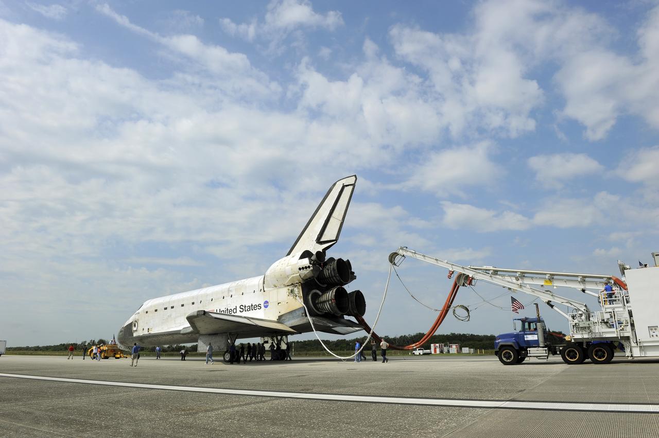 CAPE CANAVERAL, Fla. -- Space shuttle Atlantis begins its slow trek from the Shuttle Landing Facility to an orbiter processing facility at NASA's Kennedy Space Center in Florida for the last time. Atlantis' final return from space at 5:57 a.m. EDT secured the space shuttle fleet's place in history and brought a close to the America's Space Shuttle Program.            STS-135 delivered spare parts, equipment and supplies to the International Space Station. STS-135 was the 33rd and final flight for Atlantis, which has spent 307 days in space, orbited Earth 4,848 times and traveled 125,935,769 miles. For more information visit, www.nasa.gov/mission_pages/shuttle/shuttlemissions/sts135/index.html. Photo credit: NASA/Kim Shiflett