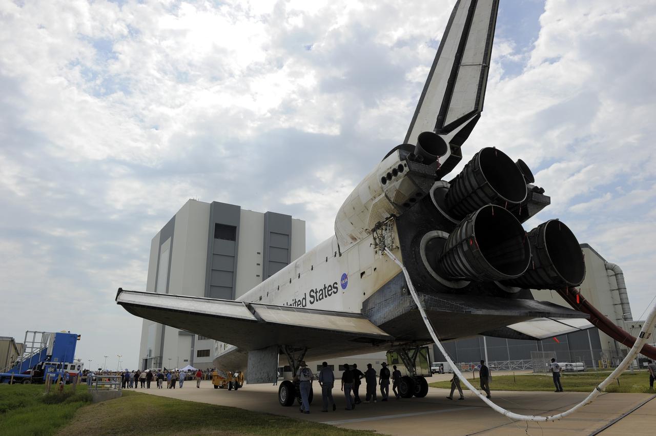 CAPE CANAVERAL, Fla. -- Space shuttle Atlantis is slowly towed from the Shuttle Landing Facility to Orbiter Processing Facility-2 at NASA's Kennedy Space Center in Florida for the last time. Atlantis' final return from space at 5:57 a.m. EDT secured the space shuttle fleet's place in history and brought a close to the America's Space Shuttle Program. There to welcome Atlantis home are the thousands of workers who have processed, launched and landed the shuttles for more than three decades.         STS-135 delivered spare parts, equipment and supplies to the International Space Station. STS-135 was the 33rd and final flight for Atlantis, which has spent 307 days in space, orbited Earth 4,848 times and traveled 125,935,769 miles. For more information visit, www.nasa.gov/mission_pages/shuttle/shuttlemissions/sts135/index.html. Photo credit: NASA/Kim Shiflett