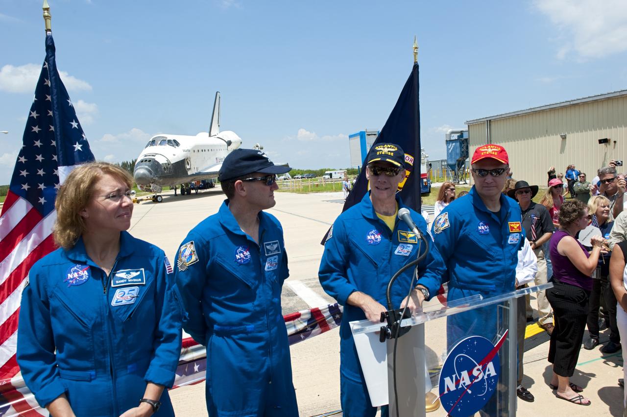 CAPE CANAVERAL, Fla. -- The STS-135 crew members express their gratitude to the thousands of workers who have processed, launched and landed the space shuttles for more than three decades during an employee appreciation event held in front of Orbiter Processing Facility-2 at NASA's Kennedy Space Center in Florida. Seen here are Mission Specialists Sandy Magnus and Rex Walheim, Commander Chris Ferguson and Pilot Doug Hurley. Atlantis' final return to Earth occurred at 5:57 a.m. EDT July 21, 2011.                      Securing the space shuttle fleet's place in history, Atlantis marks the 26th nighttime landing of NASA's Space Shuttle Program and the 78th landing at Kennedy. Atlantis and its crew delivered to the International Space Station the Raffaello multi-purpose logistics module packed with more than 9,400 pounds of spare parts, equipment and supplies that will sustain station operations for the next year. STS-135 is the 33rd and final flight for Atlantis and the final mission of the Space Shuttle Program. For more information, visit www.nasa.gov/mission_pages/shuttle/shuttlemissions/sts135/index.html. Photo credit: NASA/Kim Shiflett