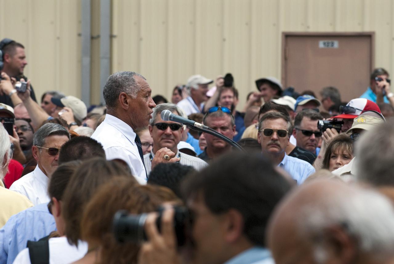 CAPE CANAVERAL, Fla. -- At NASA's Kennedy Space Center in Florida, NASA Administrator Charles Bolden thanks the Kennedy work force for their dedication at an employee appreciation event for the thousands of workers who have processed, launched and landed America's space shuttles for more than three decades. Following the successful STS-135 mission, space shuttle Atlantis was parked at the celebration site for photo opportunities. STS-135 secured the space shuttle fleet's place in history and brought a close to NASA's Space Shuttle Program. On board were STS-135 Commander Chris Ferguson, Pilot Doug Hurley, and Mission Specialists Sandra Magnus and Rex Walheim.    On the 37th shuttle mission to the International Space Station, STS-135 delivered the Raffaello multi-purpose logistics module filled with more than 9,400 pounds of spare parts, equipment and supplies that will sustain station operations for the next year. STS-135 was the 33rd and final flight for Atlantis, which has spent 307 days in space, orbited Earth 4,848 times and traveled 125,935,769 miles, and also the final mission of the Space Shuttle Program.  For more information, visit www.nasa.gov/mission_pages/shuttle/shuttlemissions/sts135/index.html. Photo credit: NASA/Kim Shiflett