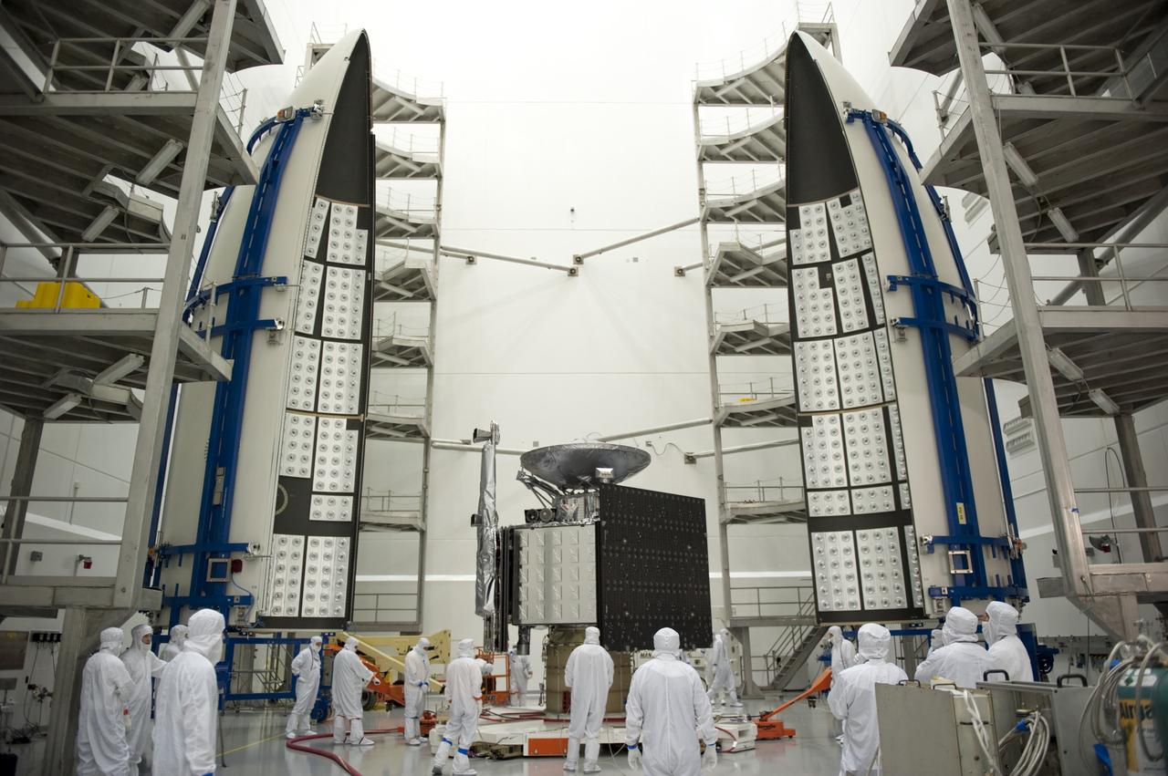 CAPE CANAVERAL, Fla. -- In the Astrotech payload processing facility near Kennedy Space Center in Florida, the Juno spacecraft is viewable for the last time before it is enclosed in the Atlas payload fairing for launch.    The fairing will protect the spacecraft from the impact of aerodynamic pressure and heating during ascent and will be jettisoned once the spacecraft is outside the Earth's atmosphere. Juno is scheduled to launch aboard a United Launch Alliance Atlas V rocket from Cape Canaveral, Fla., Aug. 5.The solar-powered spacecraft will orbit Jupiter's poles 33 times to find out more about the gas giant's origins, structure, atmosphere and magnetosphere and investigate the existence of a solid planetary core. For more information, visit www.nasa.gov/juno. Photo credit: NASA/Kim Shiflett