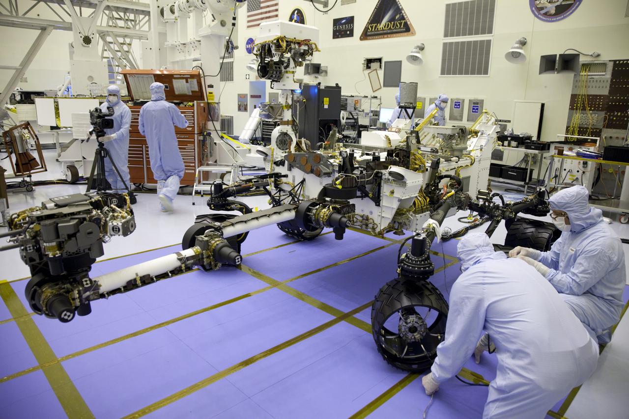 Cape Canaveral, Fla. -- Technicians at the Payload Hazardous Servicing Facility at NASA's Kennedy Space Center in Florida, put the instrument mast and science boom on NASA's Mars Science Laboratory (MSL) rover, known as Curiosity, through a series of deployment tests.    A United Launch Alliance Atlas V-541 configuration will be used to loft MSL into space. Curiosity’s 10 science instruments are designed to search for evidence on whether Mars has had environments favorable to microbial life, including chemical ingredients for life.  The unique rover will use a laser to look inside rocks and release its gasses so that the rover’s spectrometer can analyze and send the data back to Earth. MSL is scheduled to launch from Cape Canaveral Air Force Station in Florida Nov. 25 with a window extending to Dec. 18 and arrival at Mars Aug. 2012. For more information, visit http://www.nasa.gov/msl. Photo credit: NASA/Frankie Martin
