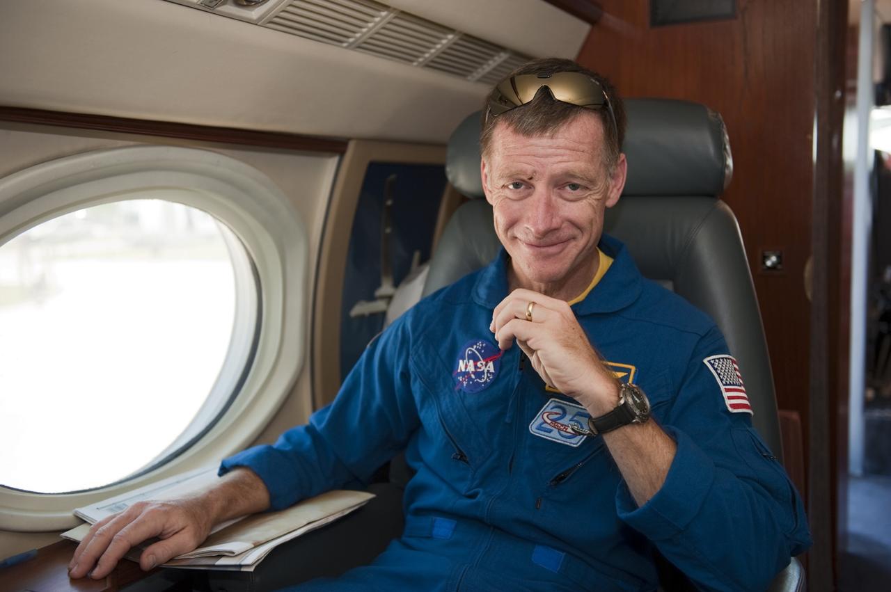 CAPE CANAVERAL, Fla. -- At NASA Kennedy Space Center's Shuttle Landing Facility, STS-135 Commander Chris Ferguson is seated in a Gulfstream III jet that will fly him and his family back to NASA's Johnson Space Center in Houston.         Space shuttle Atlantis and its crew touched down on Kennedy's Shuttle Landing Facility runway 5:57 a.m., July 21, 2011, bringing a close to 30 years of space shuttle missions. Securing the space shuttle fleet's place in history, Atlantis marked the 26th nighttime landing of the Space Shuttle Program and the 78th landing at Kennedy. Atlantis and its crew delivered to the International Space Station the Raffaello multi-purpose logistics module packed with more than 9,400 pounds of spare parts, equipment and supplies that will sustain station operations for the next year. STS-135 was the 33rd and final flight for Atlantis and the final mission of the Space Shuttle Program. For more information, visit www.nasa.gov/mission_pages/shuttle/shuttlemissions/sts135/index.html. Photo credit: NASA/Kim Shiflett