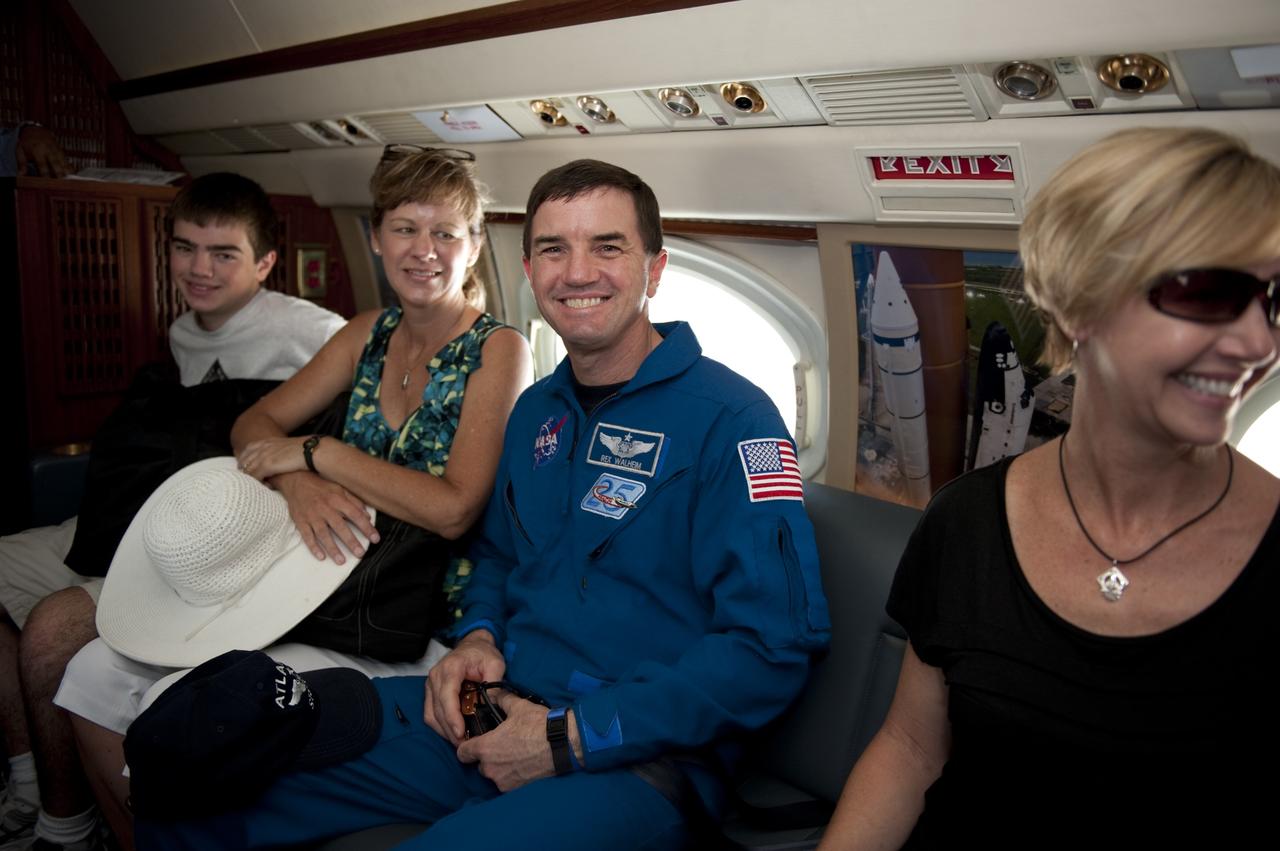 CAPE CANAVERAL, Fla. -- At NASA Kennedy Space Center's Shuttle Landing Facility, STS-135 Mission Specialist Rex Walheim is seated in a Gulfstream III jet that will fly him and his family back to NASA's Johnson Space Center in Houston.       Space shuttle Atlantis and its crew touched down on Kennedy's Shuttle Landing Facility runway 5:57 a.m., July 21, 2011, bringing a close to 30 years of space shuttle missions. Securing the space shuttle fleet's place in history, Atlantis marked the 26th nighttime landing of the Space Shuttle Program and the 78th landing at Kennedy. Atlantis and its crew delivered to the International Space Station the Raffaello multi-purpose logistics module packed with more than 9,400 pounds of spare parts, equipment and supplies that will sustain station operations for the next year. STS-135 was the 33rd and final flight for Atlantis and the final mission of the Space Shuttle Program. For more information, visit www.nasa.gov/mission_pages/shuttle/shuttlemissions/sts135/index.html. Photo credit: NASA/Kim Shiflett