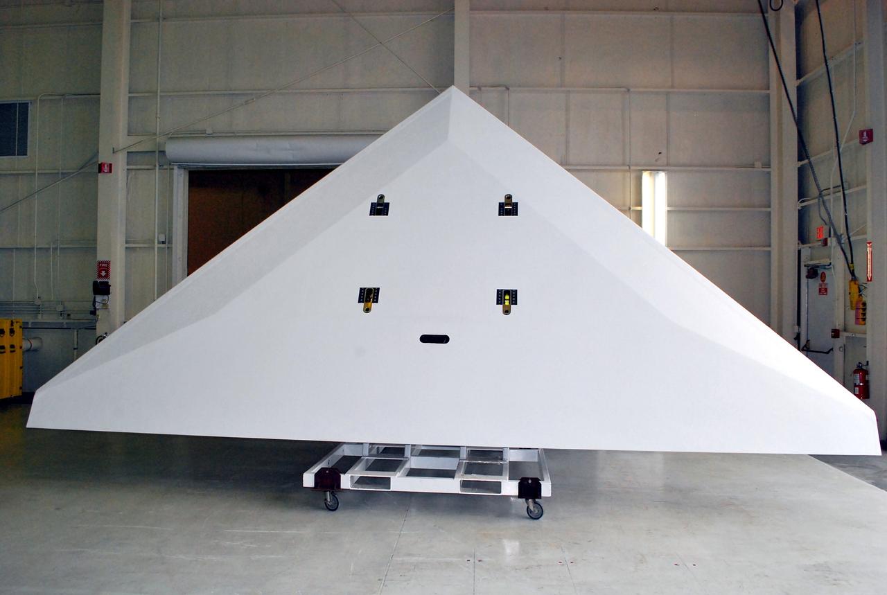 VANDENBERG AIR FORCE BASE, Calif. -- The wing of the Pegasus XL launch vehicle awaits processing in a clean room at Vandenberg Air Force Base in California.  The Orbital Sciences Corp. Pegasus rocket will launch the Nuclear Spectroscopic Telescope Array (NuSTAR) into space.    After the rocket and spacecraft are processed at Vandenberg, they will be flown on the Orbital Sciences' L-1011 carrier aircraft to the Ronald Reagan Ballistic Missile Defense Test Site at the Pacific Ocean’s Kwajalein Atoll for launch. The high-energy X-ray telescope will conduct a census for black holes, map radioactive material in young supernovae remnants, and study the origins of cosmic rays and the extreme physics around collapsed stars. For more information, visit science.nasa.gov/missions/nustar/. Photo credit: NASA/Randy Beaudoin, VAFB