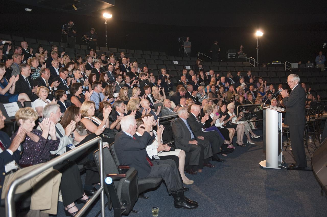 CAPE CANAVERAL, Fla. -- The Apollo/Saturn V Center at NASA's Kennedy Space Center in Florida hosted a celebration on the 40th anniversary of NASA's Apollo 15 mission. Apollo 15 Commander Dave Scott, Command Module Pilot Al Worden and an elite gathering of Apollo-era astronauts were on hand for the event and panel discussion. Here, Apollo 16 Lunar Module Pilot Charlie Duke welcomes the invited guests and introduces the guests of honor. Worden circled the moon while Scott and the late Jim Irwin, the Lunar Module commander, made history when they became the first humans to drive a vehicle on the surface of the moon. They also provided extensive descriptions and photographic documentation of geologic features in the vicinity of the Hadley Rille landing site during their three days on the lunar surface. Photo credit: NASA/Kim Shiflett