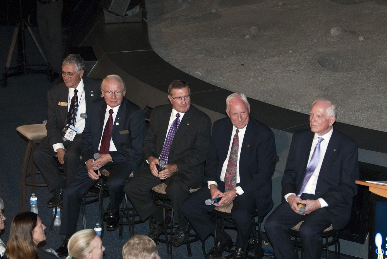 CAPE CANAVERAL, Fla. -- The Apollo/Saturn V Center at NASA's Kennedy Space Center in Florida hosted a celebration on the 40th anniversary of NASA's Apollo 15 mission. Apollo 15 Commander Dave Scott and Command Module Pilot Al Worden and an elite gathering of Apollo-era astronauts were on hand for the event and panel discussion. Seen here are Apollo 15 astronaut backup support crew members, Jack Schmitt (left), Vance Brand and Dick Gordon; Al Worden and Dave Scott. Worden circled the moon while Scott and the late Jim Irwin, the Lunar Module commander, made history when they became the first humans to drive a vehicle on the surface of the moon. They also provided extensive descriptions and photographic documentation of geologic features in the vicinity of the Hadley Rille landing site during their three days on the lunar surface. Photo credit: NASA/Kim Shiflett