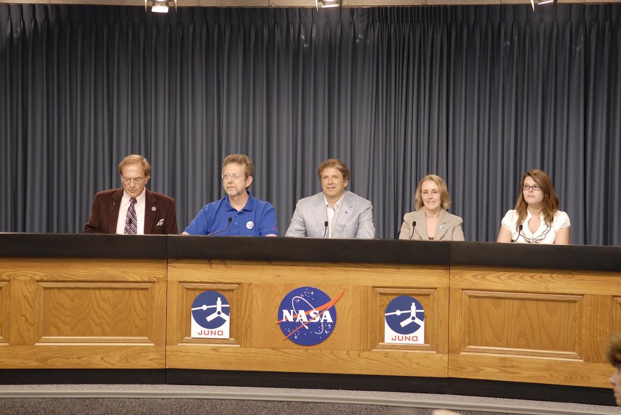 CAPE CANAVERAL, Fla. -- In the Press Site auditorium at NASA's Kennedy Space Center in Florida, a briefing was held to update media on the upcoming launch of NASA's Juno spacecraft. Seen here are NASA Panel Moderator and Public Affairs Officer George Diller (left), Jim Green, director of the Planetary Science Division at Headquarters in Washington, D.C.; Scott Bolton, Juno principal investigator with the Southwest Research Institute in San Antonio, Texas; Jan Chodas, Juno project manager with the Jet Propulsion Laboratory in Pasadena, Calif., and  Kaelyn Badura, Pine Ridge High School, Deltona, Fla. high school student, Juno Education program participant and Goldstone Apple Valley Radio Telescope Project participant.                Juno is scheduled to launch aboard an United Launch Alliance Atlas V from Cape Canaveral, Fla. Aug. 5.The solar-powered spacecraft will orbit Jupiter's poles 33 times to find out more about the gas giant's origins, structure, atmosphere and magnetosphere and investigate the existence of a solid planetary core. For more information visit: www.nasa.gov/juno. Photo credit: NASA/Gianni M. Woods