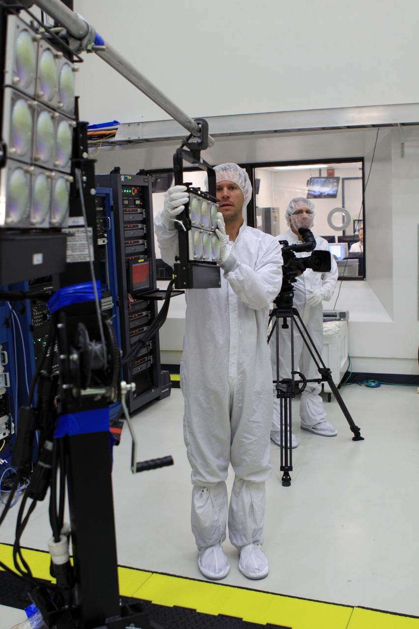 CAPE CANAVERAL, Fla. -- Lockheed Martin technicians in Astrotech Space Operation's payload processing facility in Titusville, Fla., prepare to test the solar arrays on NASA's Gravity Recovery and Interior Laboratory-A, or GRAIL-A, spacecraft to ensure that they will function as planned during the mission.     The electrical power subsystem on each of GRAIL's twin spacecraft includes two solar arrays and a lithium ion battery. Each solar array is capable of producing no less than 700 watts. They will be deployed shortly after separation from the launch vehicle and remain fixed throughout the mission. GRAIL will fly in tandem orbits around the moon for several months to measure its gravity field. GRAIL's primary science objectives are to determine the structure of the lunar interior, from crust to core, and to advance understanding of the thermal evolution of the moon.  Launch aboard a United Launch Alliance Delta II rocket from Space Launch Complex 17B on Cape Canaveral Air Force Station is scheduled for Sept. 8.  For more information, visit http://www.nasa.gov/grail. Photo credit: NASA/Frankie Martin