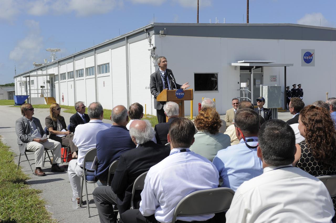 CAPE CANAVERAL, Fla. -- At the Merritt Island Launch Annex (MILA) Spaceflight Tracking and Data Network Station at NASA's Kennedy Space Center in Florida, Jeff Volosin, associate director, Exploration and Communications, NASA Goddard Space Flight Center, addresses those in attendance at a closing ceremony recognizing the station's 45 years of service.    The station was originally established by NASA's Goddard Space Flight Center as one of 17 Space Flight Tracking and Data Network stations around the world. Commissioned for the Apollo Program, the first launch it supported was the Apollo/Saturn 203 test flight from Launch Complex 37 on July 5, 1966. It also provided orbital support for low earth-orbiting scientific satellites. In recent history, the station has been used almost exclusively for space shuttle launch and landing support. Following the final launch and landing of the Space Shuttle Program in July 2011, the MILA station is officially decommissioned. For more information, visit http://www.nasa.gov/centers/kennedy/pdf/167424main_MILA-08C.pdf. Photo credit: NASA/Kim Shiflett