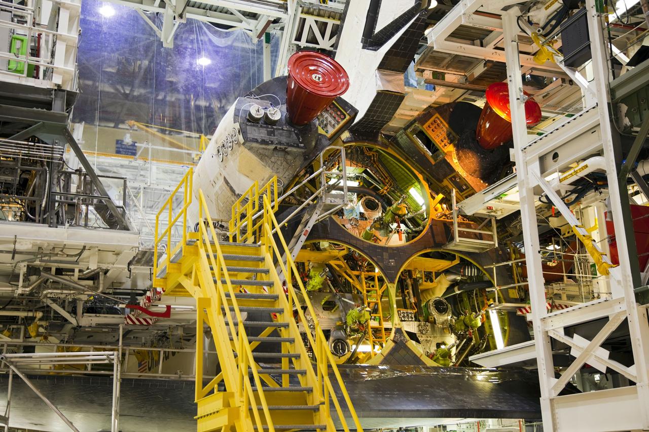 CAPE CANAVERAL, Fla. -- In Orbiter Processing Facility-1 at NASA’s Kennedy Space Center in Florida, the main engines have been removed from shuttle Endeavour and work begins to remove the orbital maneuvering system, or OMS, pods from the spacecraft.   The work is part of Endeavour’s transition and retirement processing. The spacecraft is being prepared for public display at the California Science Center in Los Angeles. Endeavour flew 25 missions, spent 299 days in space, orbited Earth 4,671 times and traveled 122, 883, 151 miles over the course of its 19-year career. Endeavour’s STS-134 and final mission was completed after landing on June 1, 2011. Photo credit: Frank Michaux