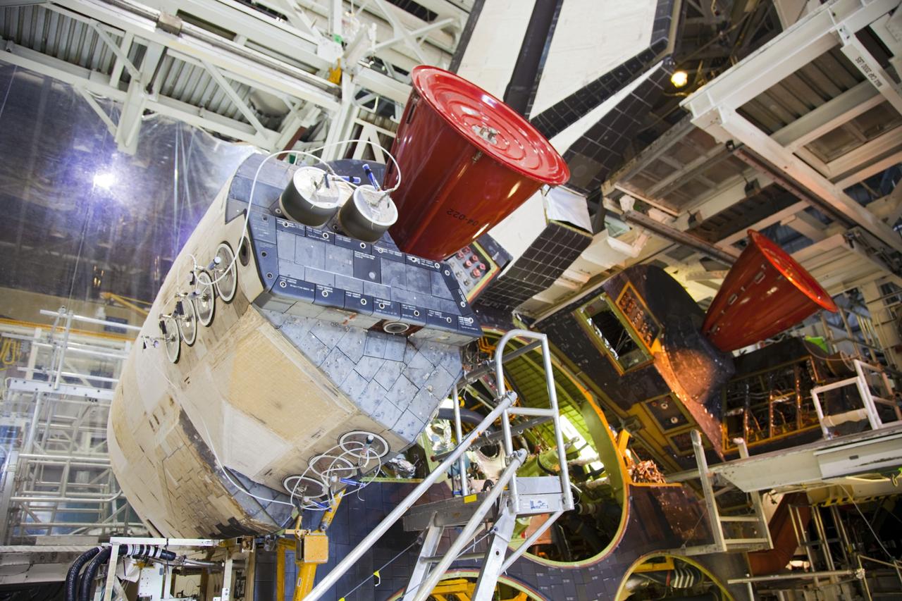 CAPE CANAVERAL, Fla. -- In Orbiter Processing Facility-1 at NASA’s Kennedy Space Center in Florida, the main engines have been removed from shuttle Endeavour and work begins to remove the orbital maneuvering system, or OMS, pods from the spacecraft. The work is part of Endeavour’s transition and retirement processing. The spacecraft is being prepared for public display at the California Science Center in Los Angeles. Endeavour flew 25 missions, spent 299 days in space, orbited Earth 4,671 times and traveled 122, 883, 151 miles over the course of its 19-year career. Endeavour’s STS-134 and final mission was completed after landing on June 1, 2011. Photo credit: Frank Michaux