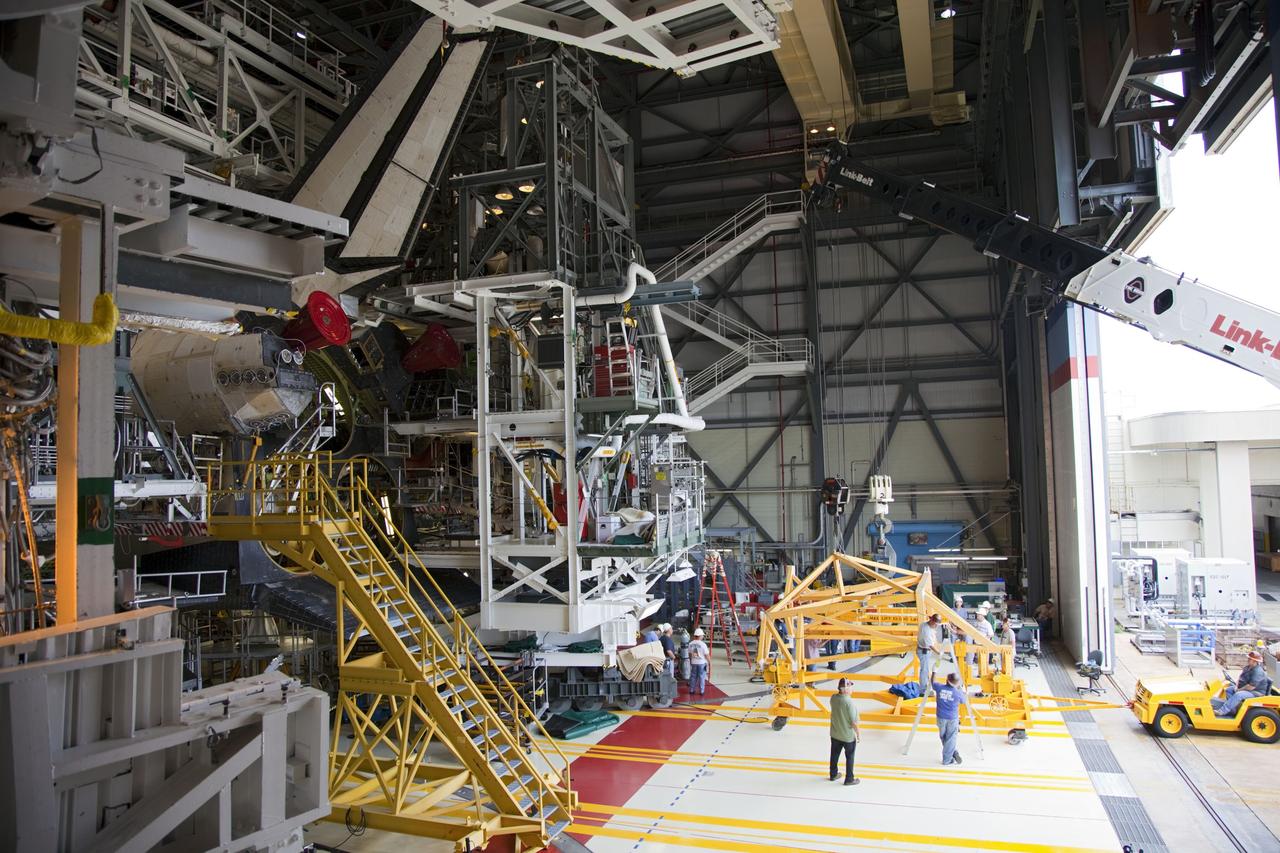 CAPE CANAVERAL, Fla. -- In Orbiter Processing Facility-1 at NASA’s Kennedy Space Center in Florida, the main engines have been removed from shuttle Endeavour and workers begin to remove the orbital maneuvering system, or OMS, pods from the spacecraft. The work is part of Endeavour’s transition and retirement processing. The spacecraft is being prepared for public display at the California Science Center in Los Angeles. Endeavour flew 25 missions, spent 299 days in space, orbited Earth 4,671 times and traveled 122, 883, 151 miles over the course of its 19-year career. Endeavour’s STS-134 and final mission was completed after landing on June 1, 2011. Photo credit: Frank Michaux